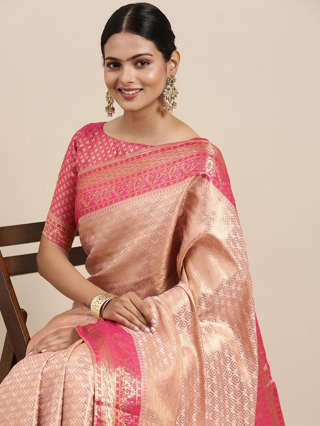 

Saree mall Peach-Coloured Ethnic Motifs Zari Silk Blend Banarasi Sarees