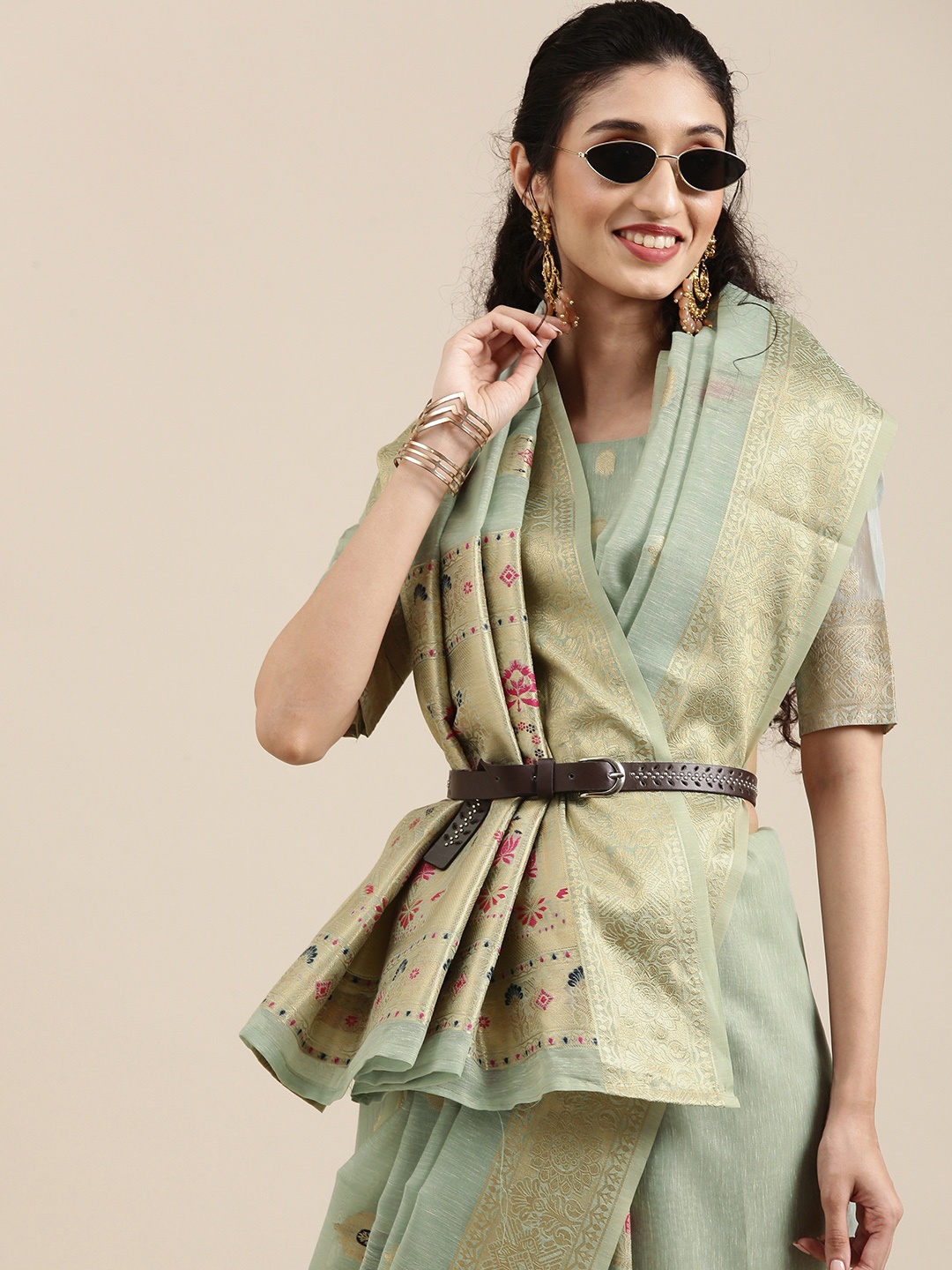 

Saree mall Turquoise Blue Ethnic Motifs Zari Silk Blend Banarasi Sarees