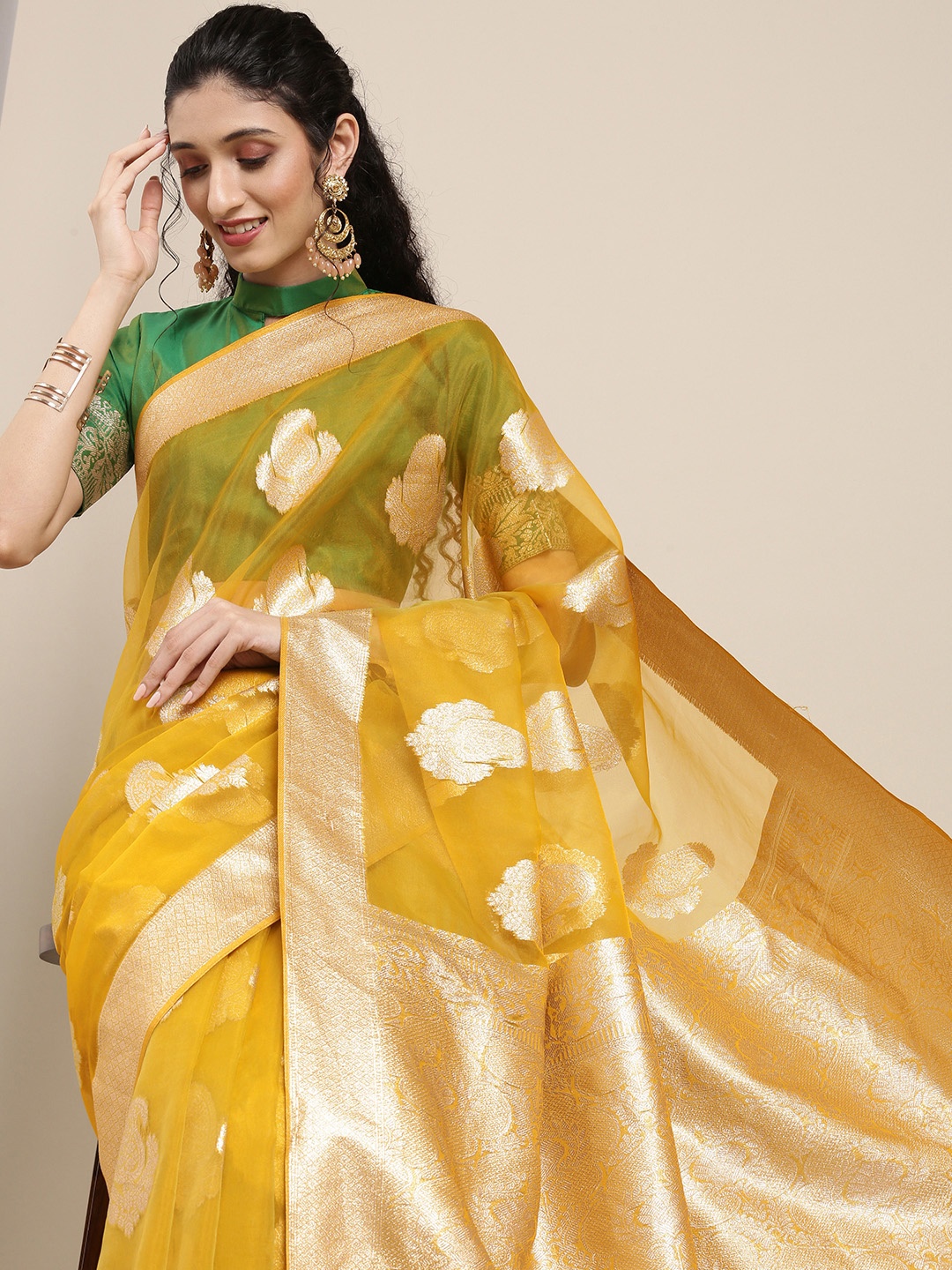 

Saree mall Yellow Ethnic Motifs Zari Organza Banarasi Sarees