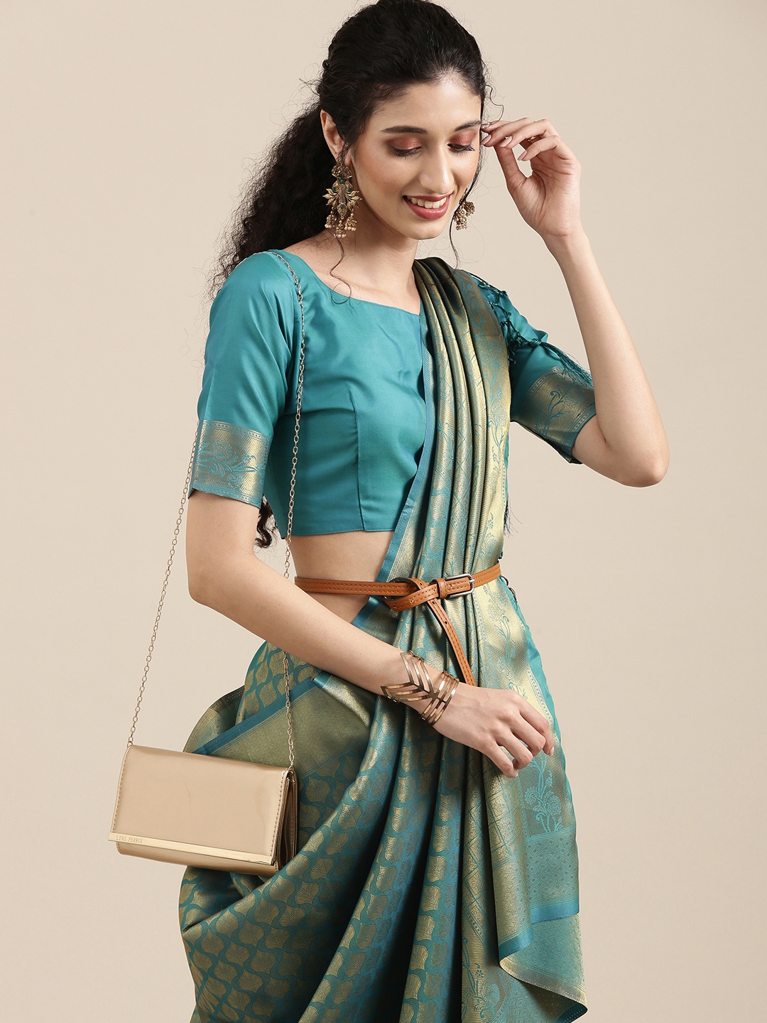 

Saree mall Teal Ethnic Motifs Zari Silk Blend Banarasi Sarees