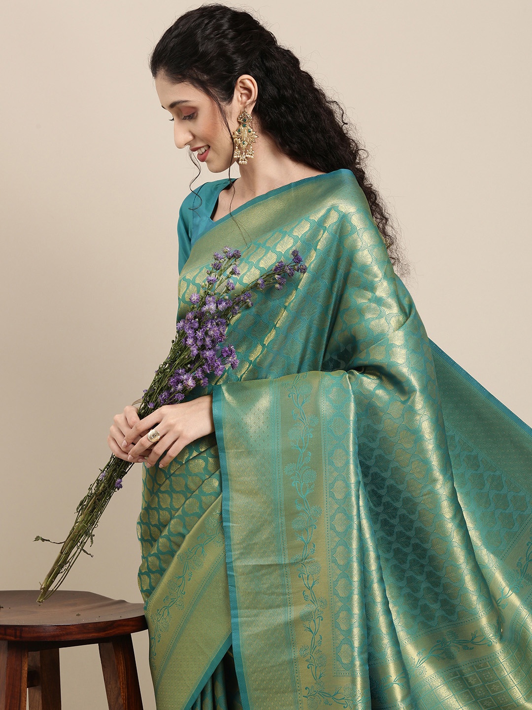 

Saree mall Teal Ethnic Motifs Zari Silk Blend Banarasi Sarees