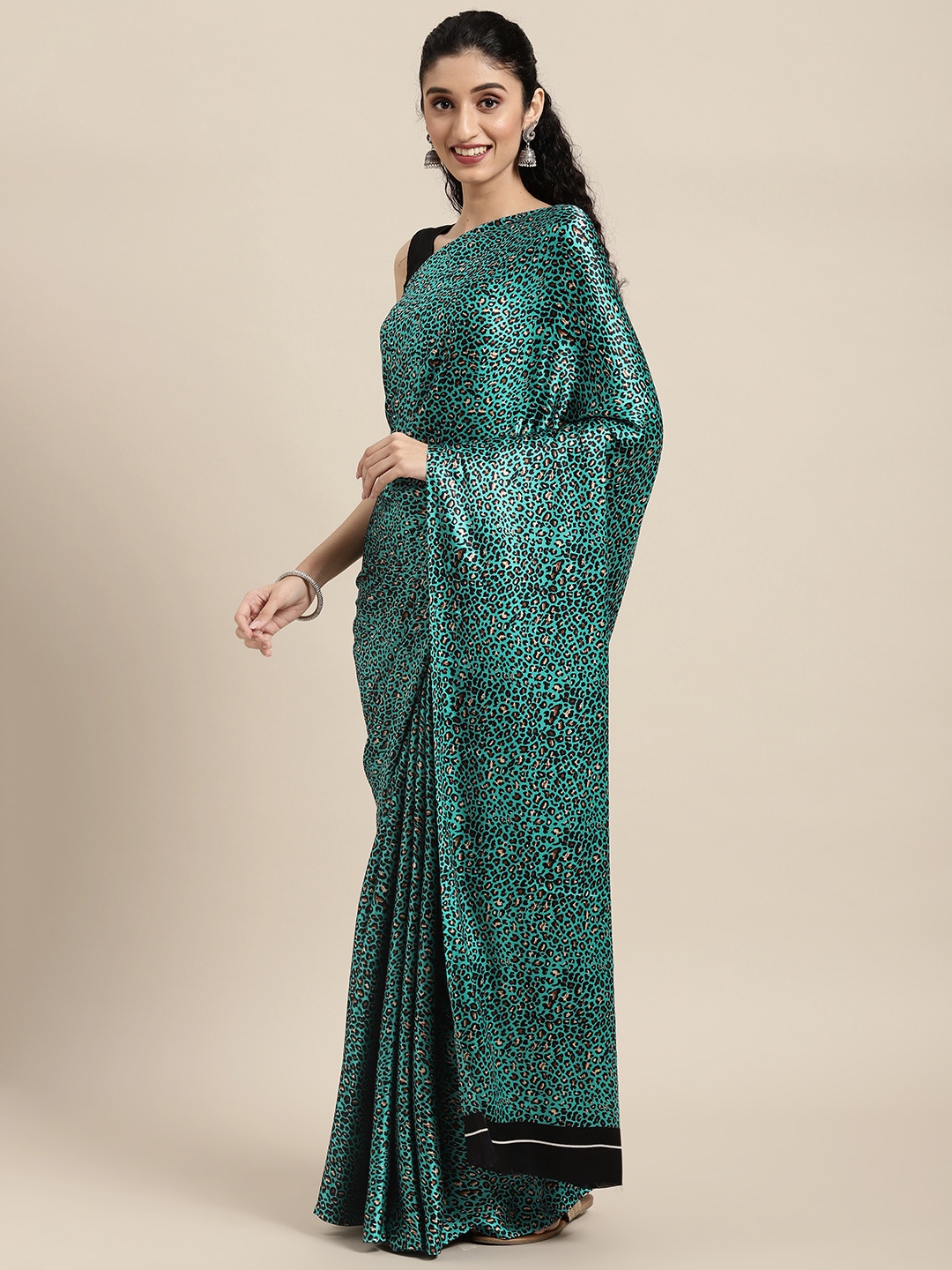 

Rajesh Silk Mills Teal & Black Printed Saree