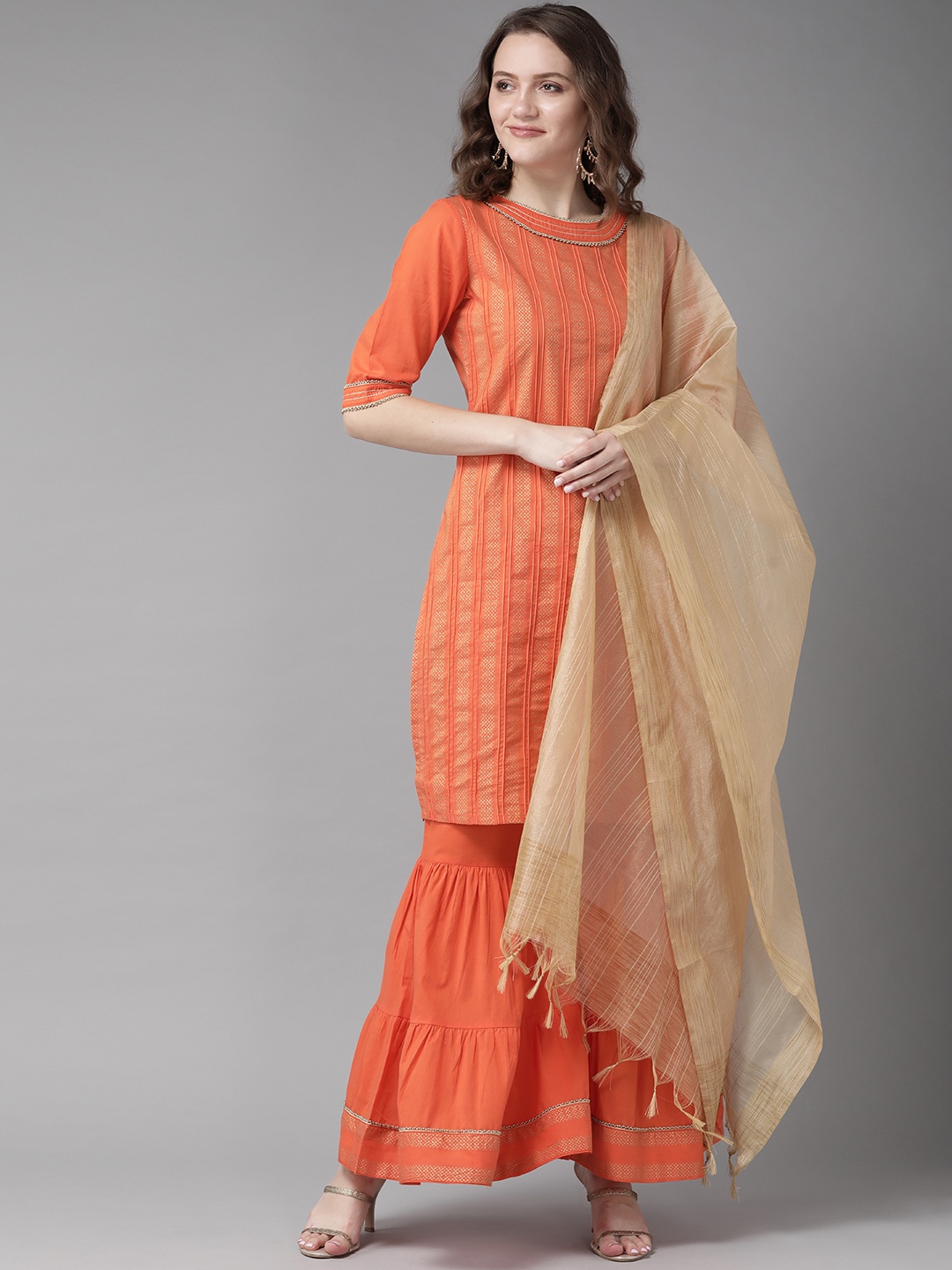 

Amirah s Women Orange Ethnic Motifs Printed Regular Beads and Stones Pure Cotton Kurta with Sharara & With