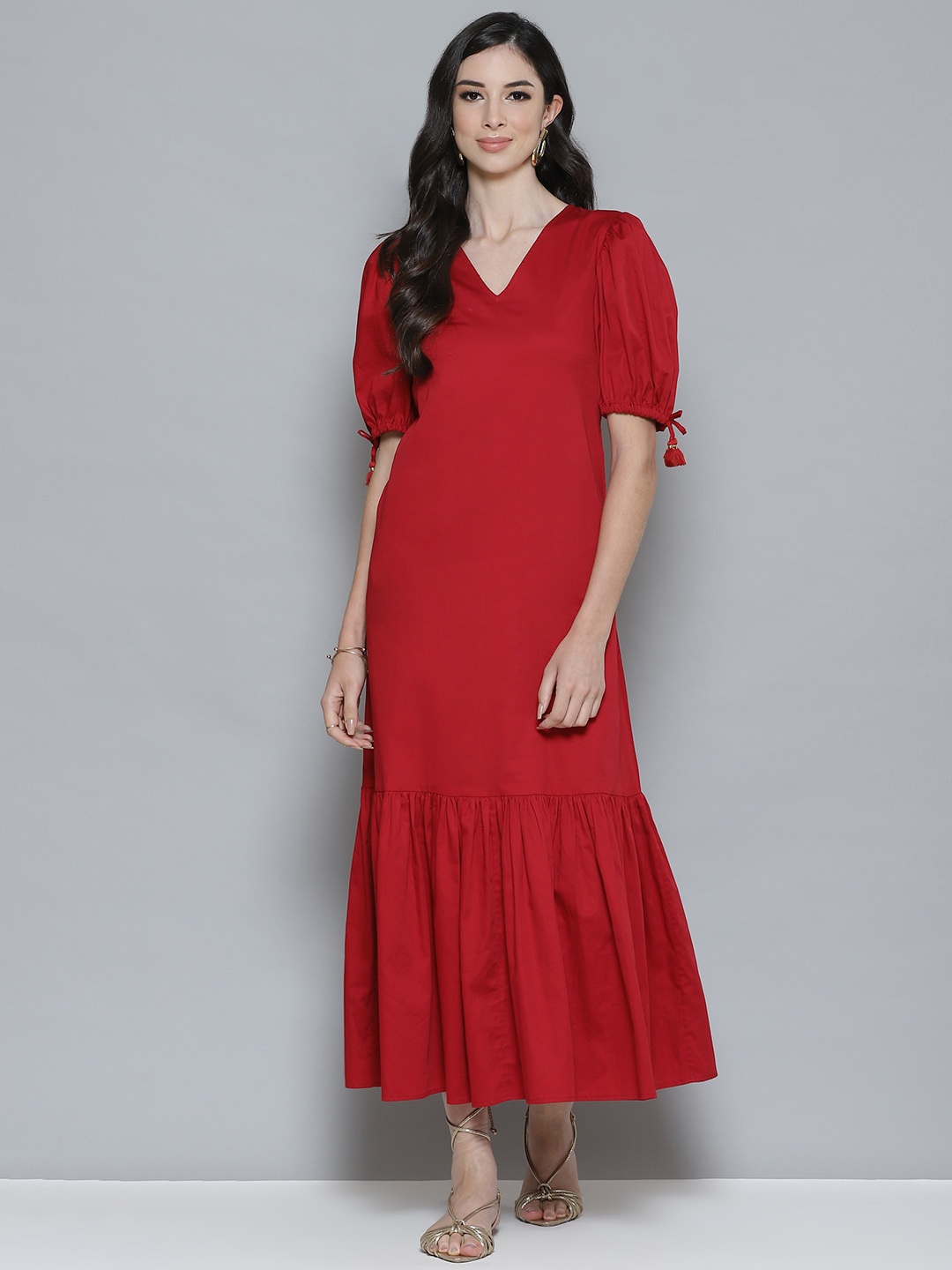 

Femella Women Red Solid Cotton Flounce Hem Maxi Dress