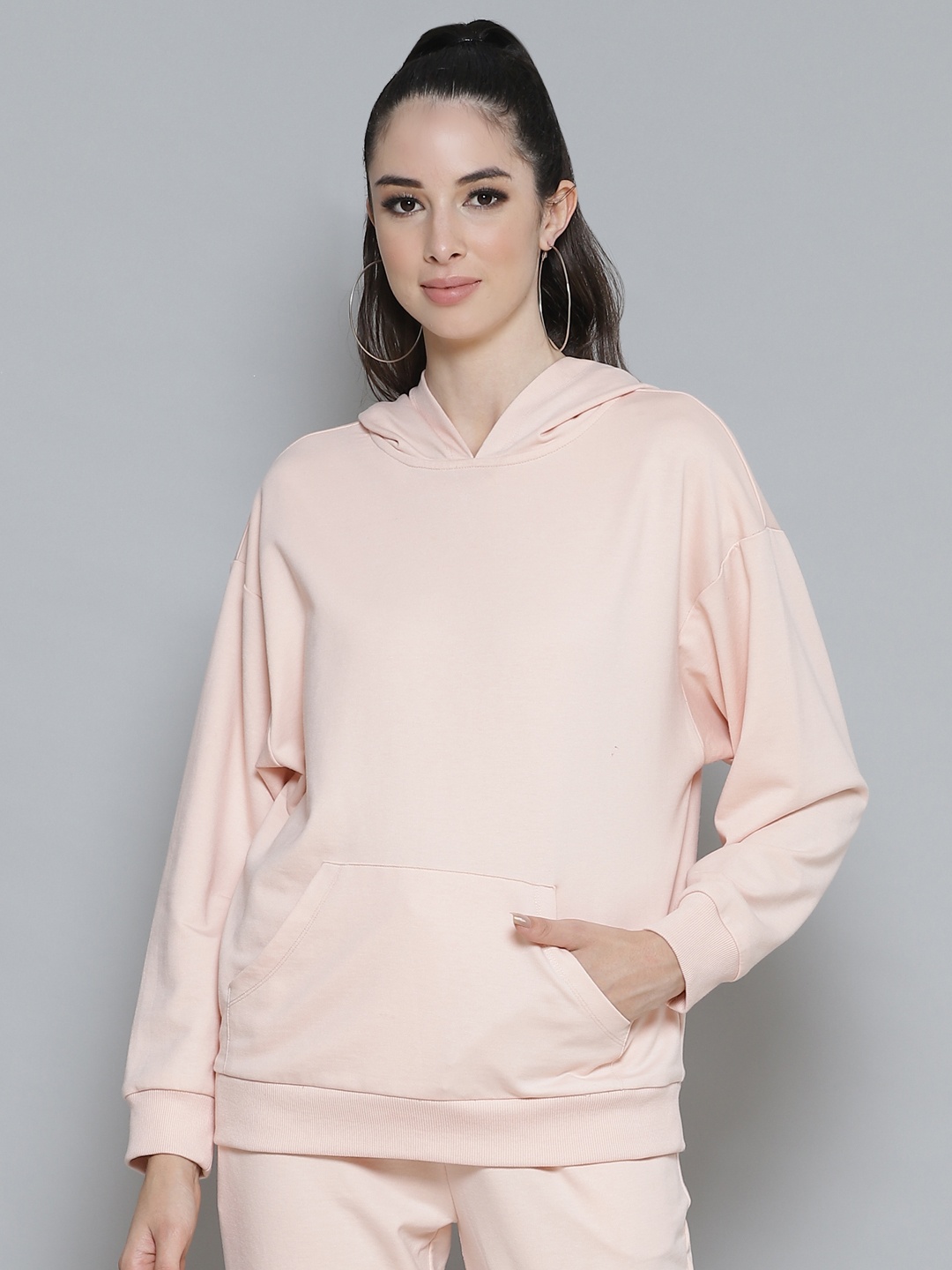 

Femella Women Pink Drop Shoulder Hooded Sweatshirt