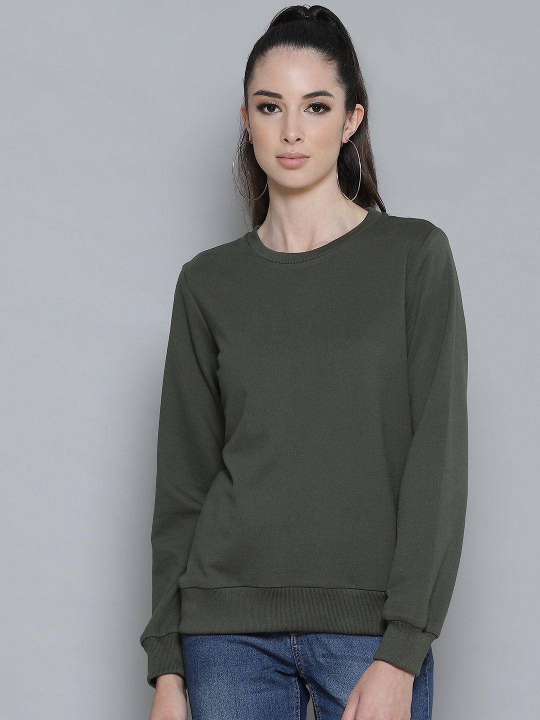 

Femella Women Olive Green Solid Sweatshirt