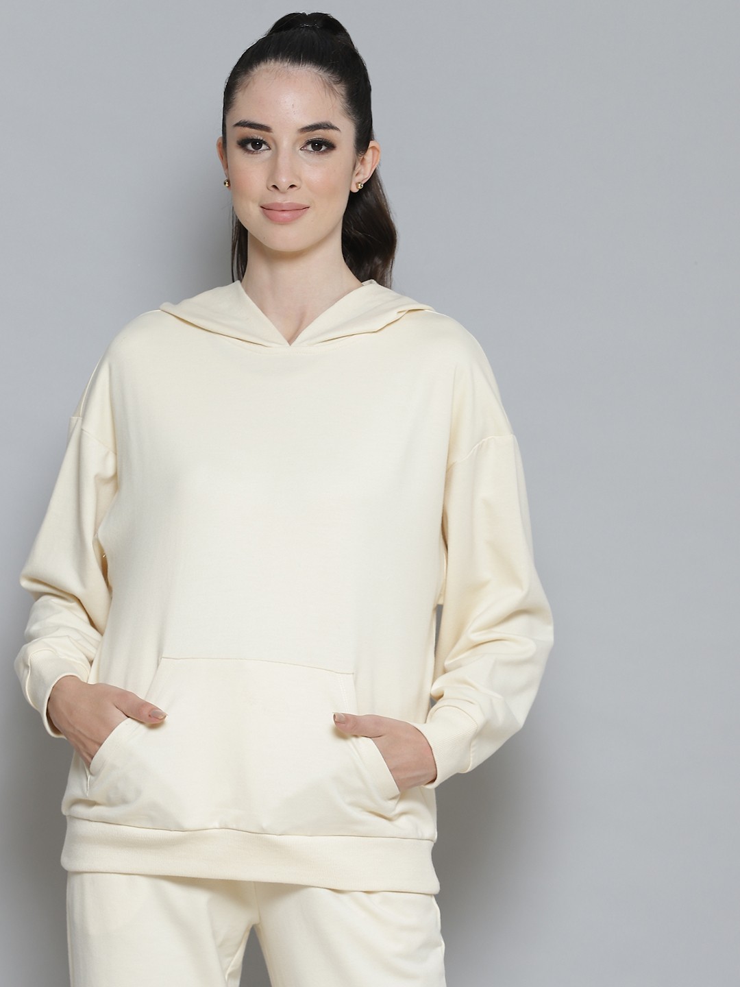 

Femella Women Off White Hooded Sweatshirt