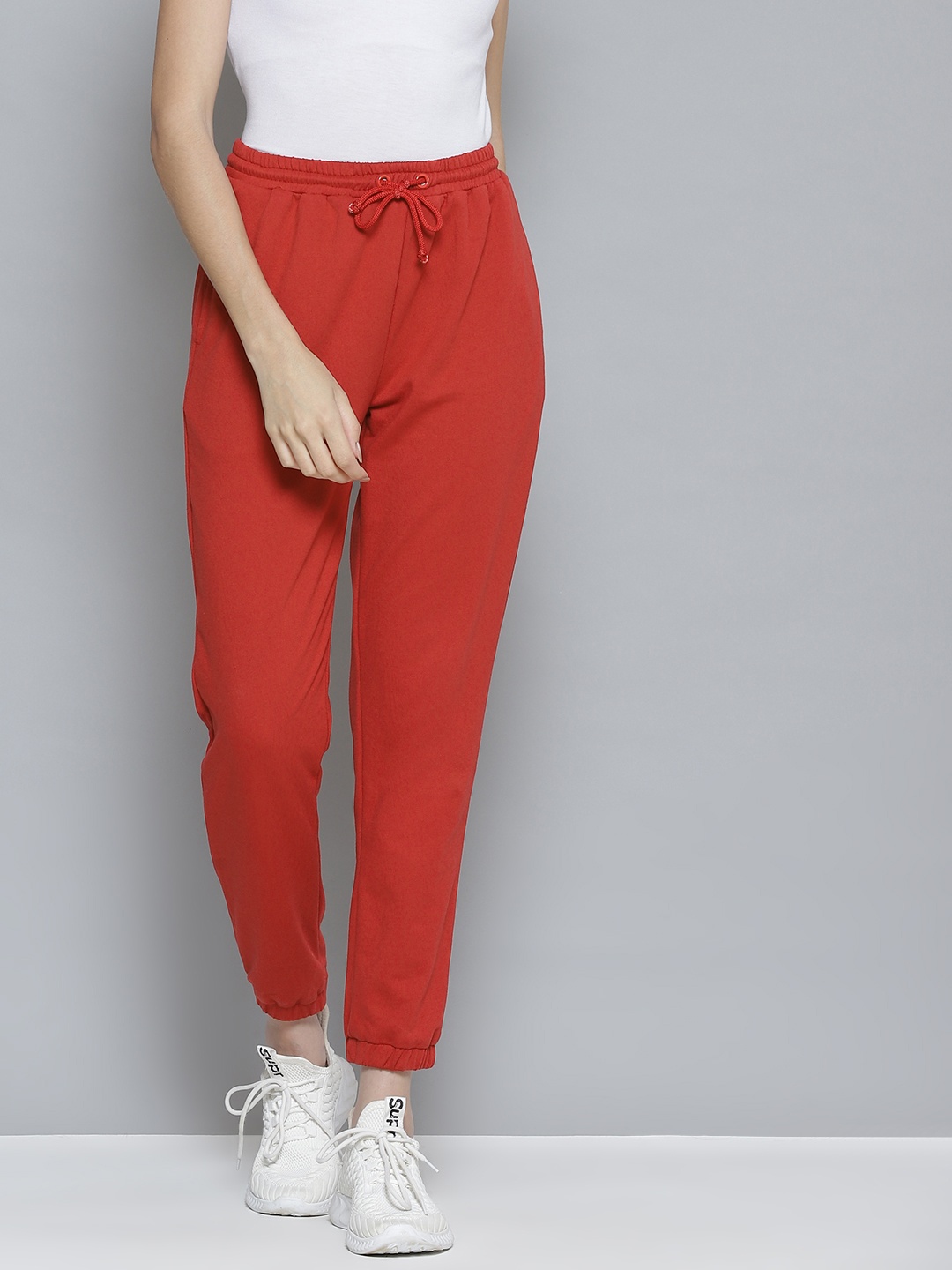 

Femella Women Red Solid Track Pants