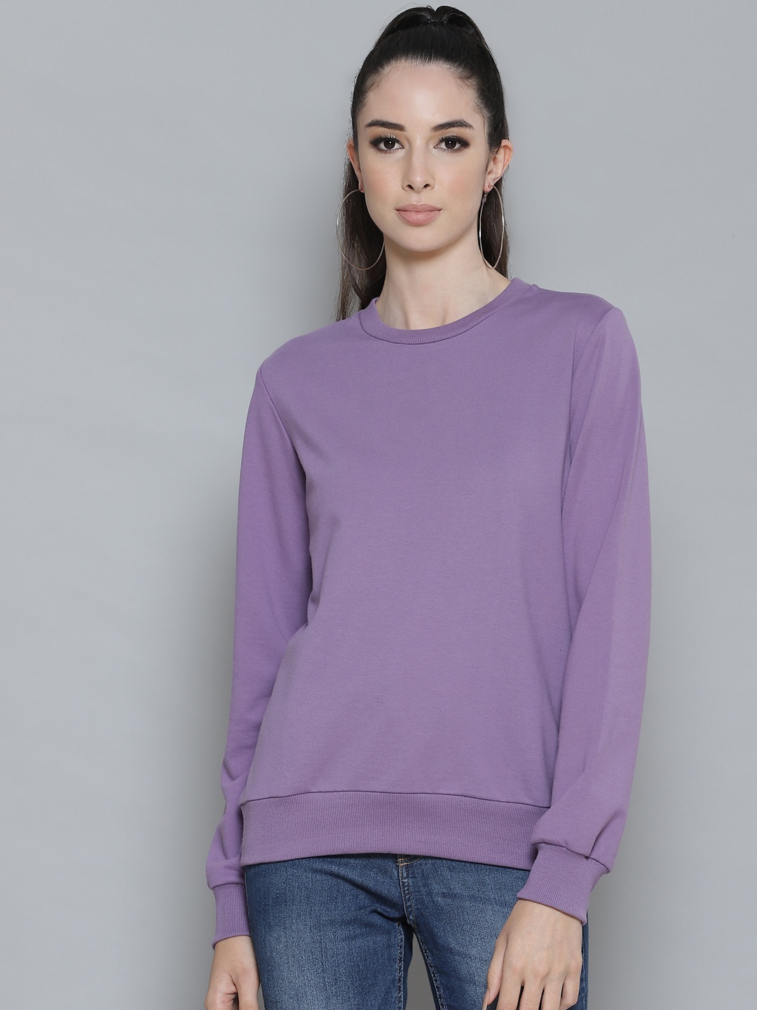 

Femella Women Lavender Solid Sweatshirt