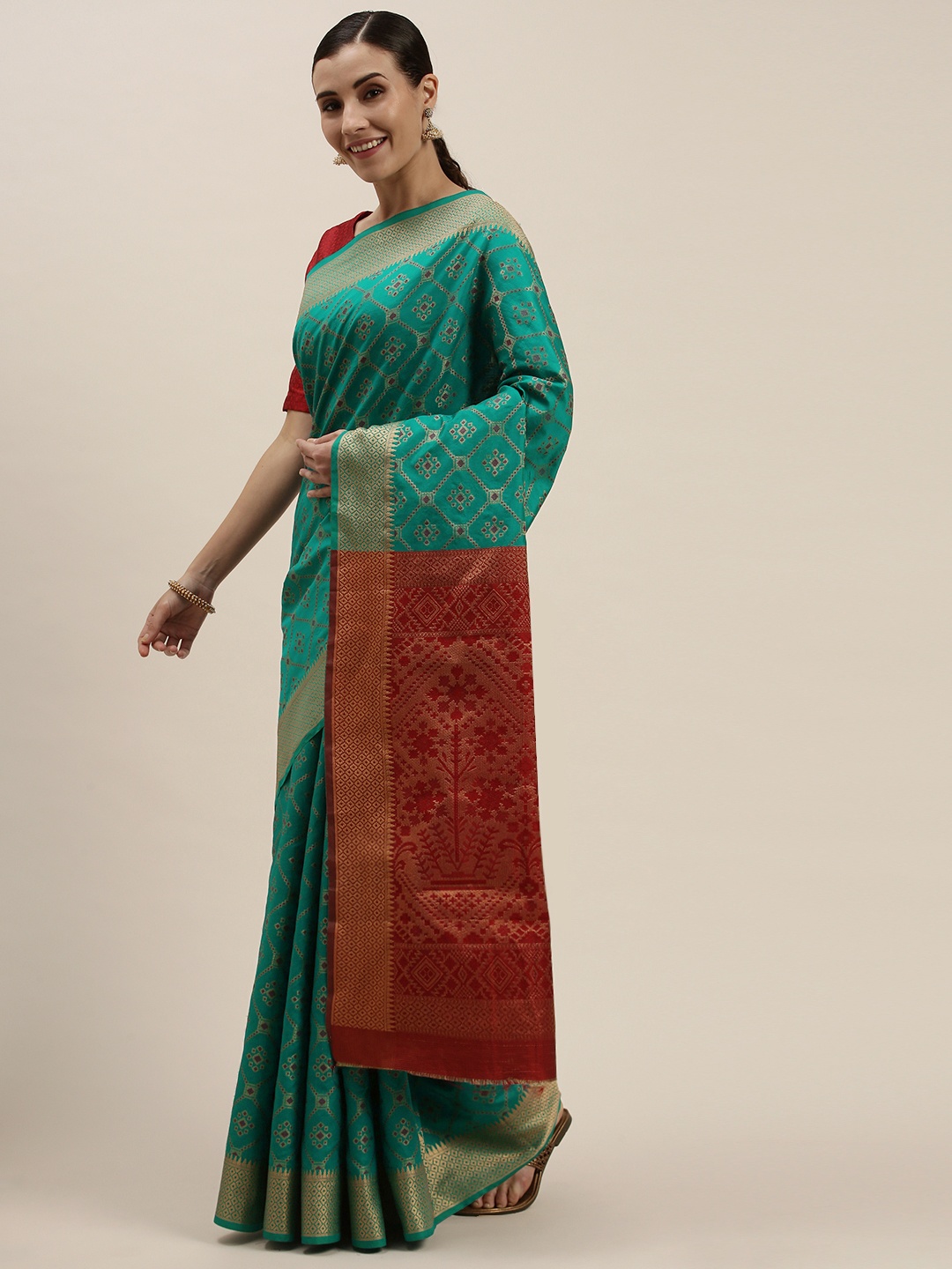 

Mitera Sea Green & Red Woven Design Zari Silk Blend Saree