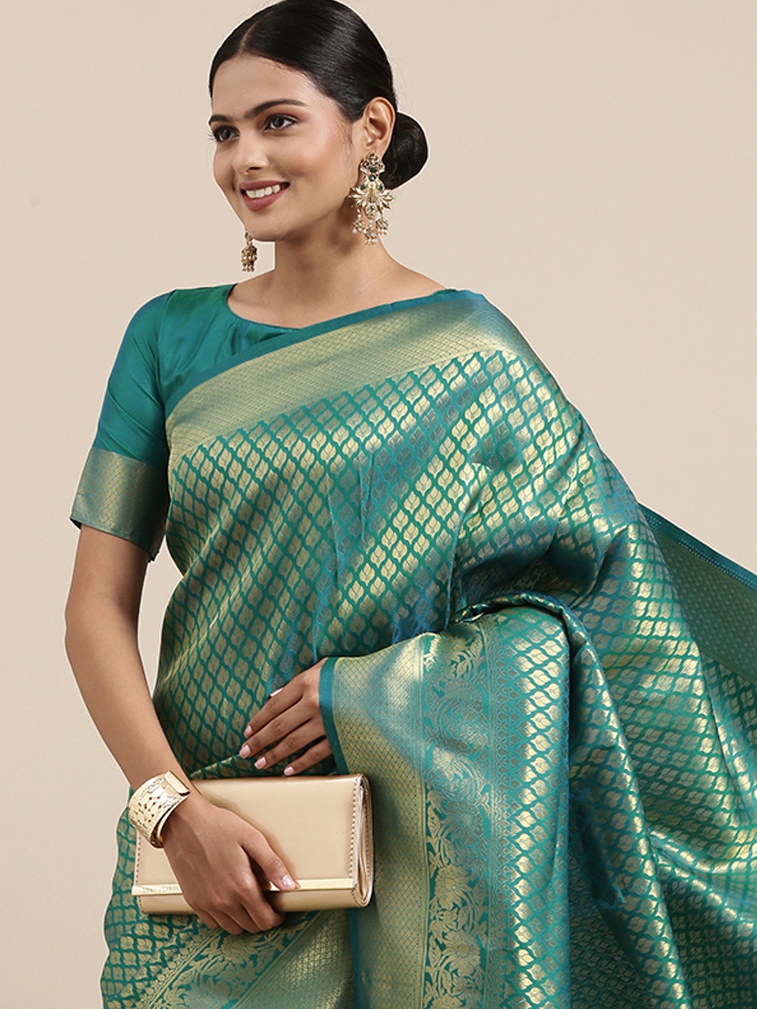 

Saree mall Teal Ethnic Motifs Zari Silk Blend Banarasi Sarees