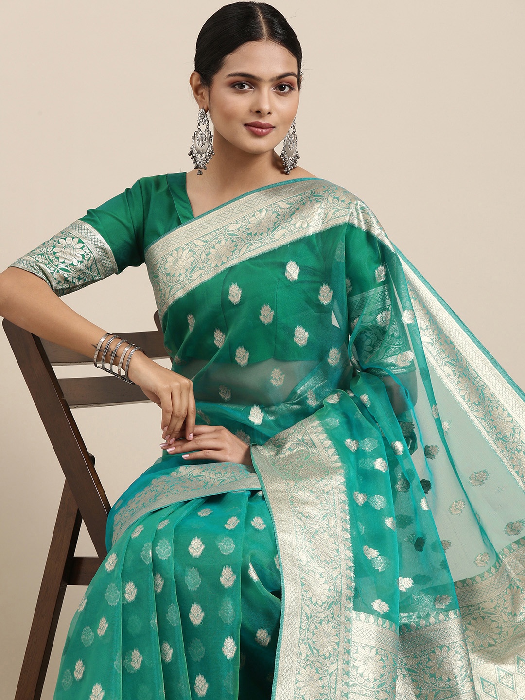 

Saree mall Green Ethnic Motifs Zari Organza Banarasi Sarees