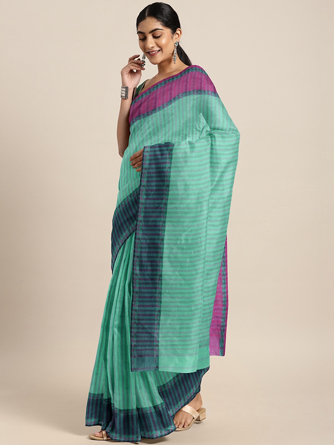 

Kalakari India Green & Purple Woven Design Silk Cotton Taant Saree