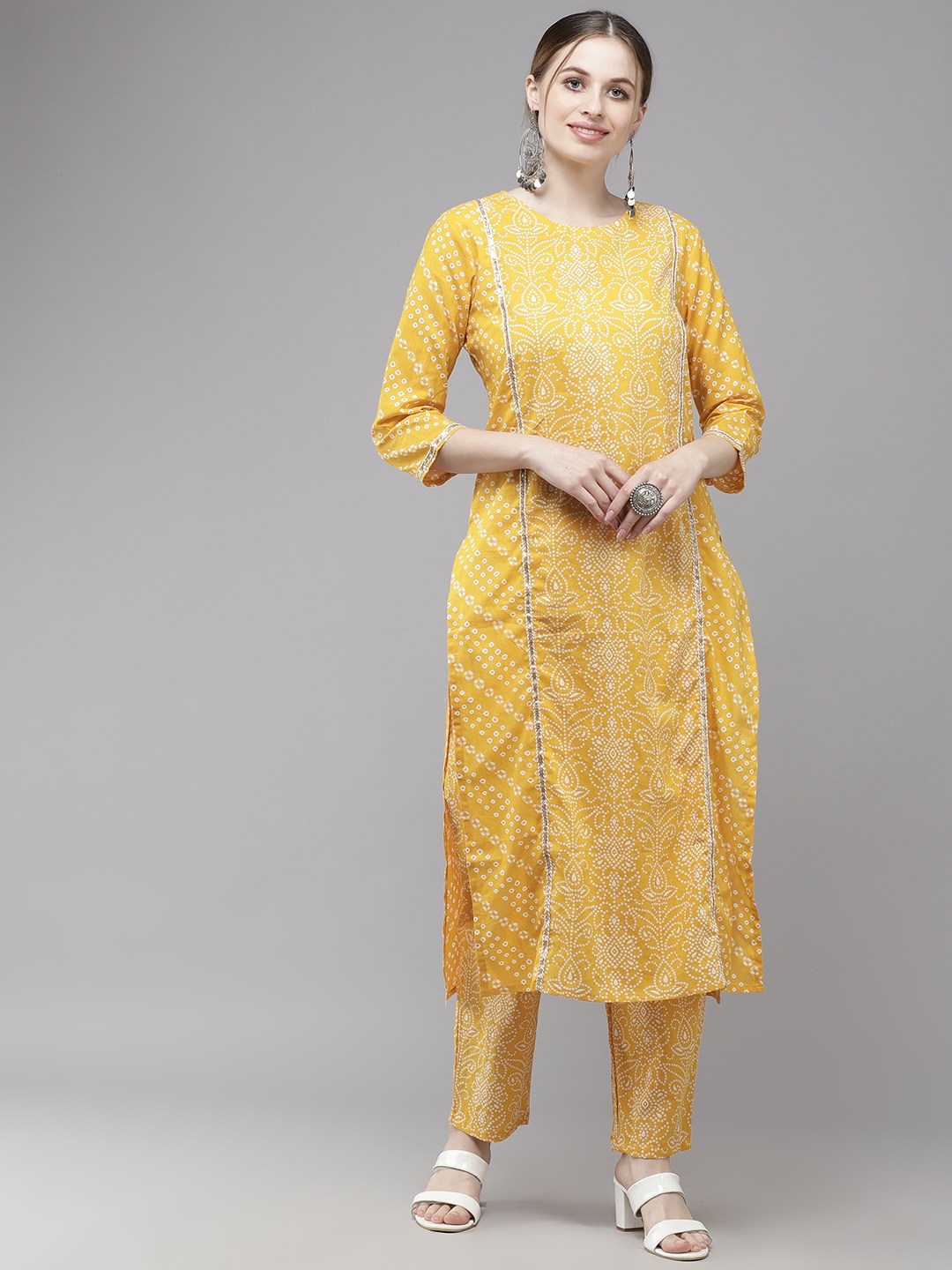 

Indo Era Women Yellow Bandhani Printed Regular Gotta Patti Pure Cotton Kurta with Trousers