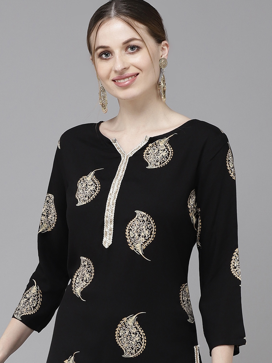 

Indo Era Women Black Printed Regular Kurta with Palazzos