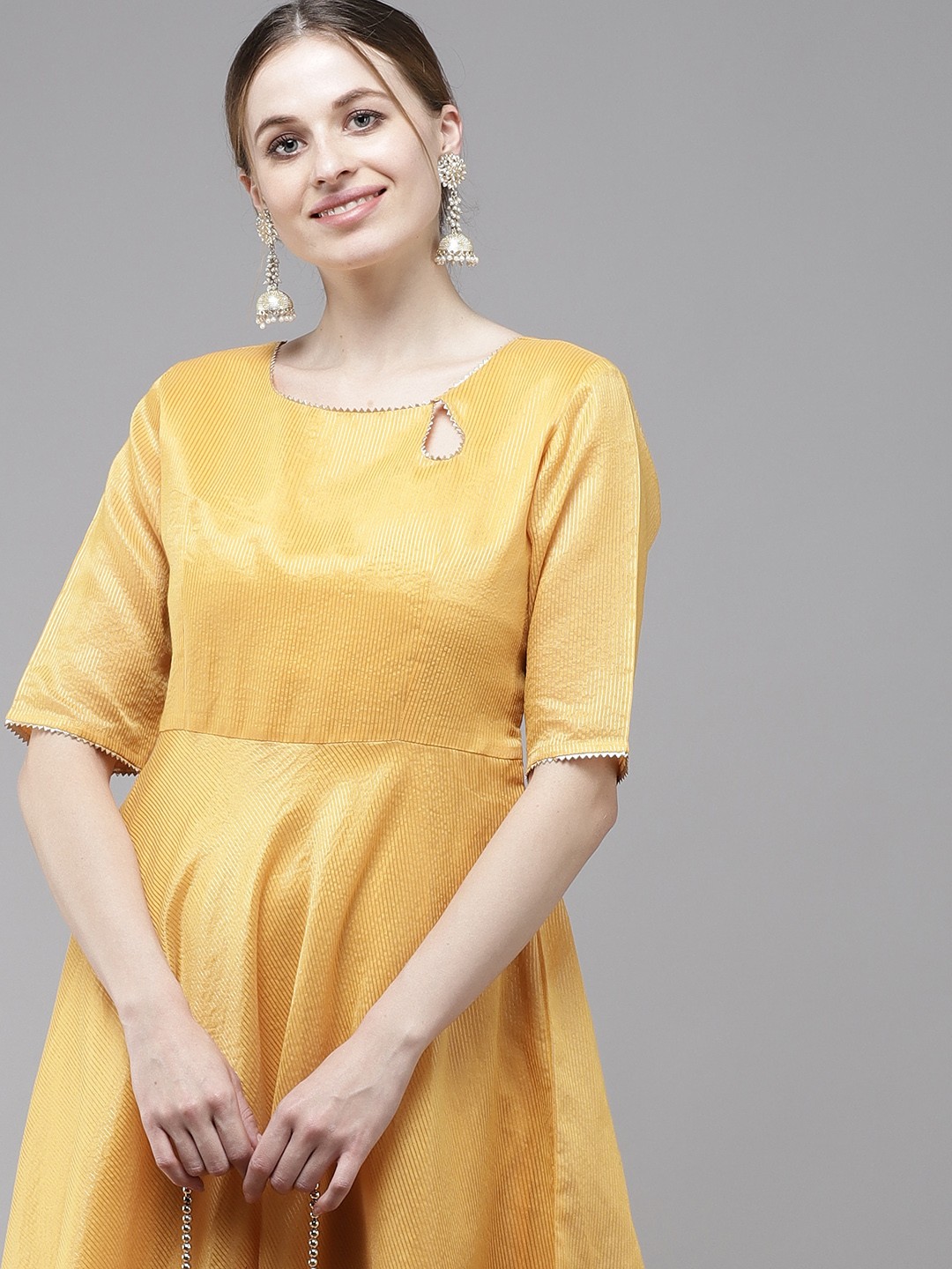 

Indo Era Women Yellow Striped Kurta