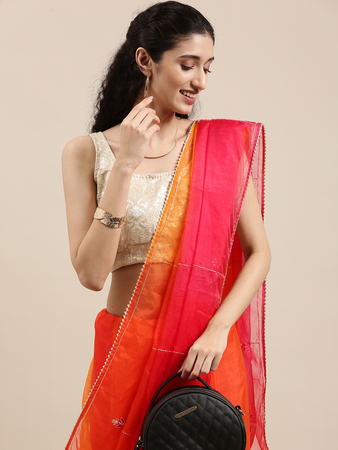 

Geroo Jaipur Red Ethnic Motifs Beads and Stones Organza Saree