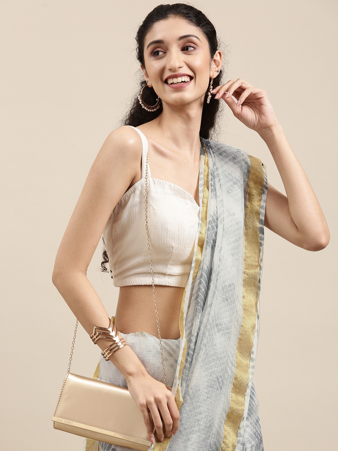 

Geroo Jaipur Grey & White Bandhani Zari Art Silk Kota Saree