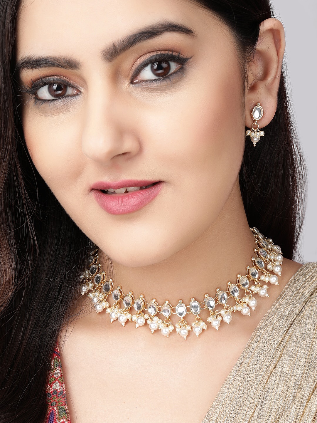 

Rubans Gold Plated White Kundan Studded Pearl Beaded Handcrafted Traditional Jewellery Set