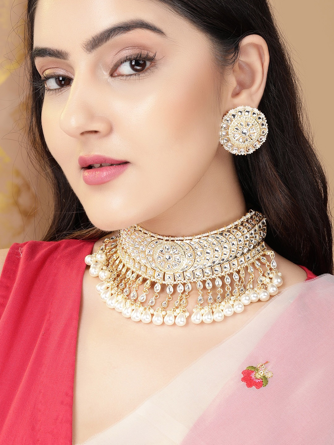 

Rubans Gold-Toned & White Alloy Gold-Plated Kundan-Studded Handcrafted Jewellery Set