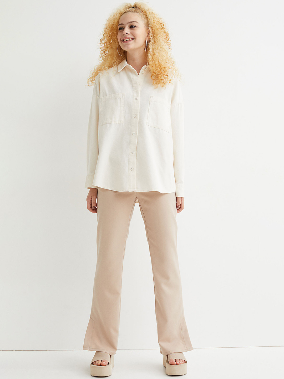 

H&M Women Beige Solid Slit-Detail Flared Trousers