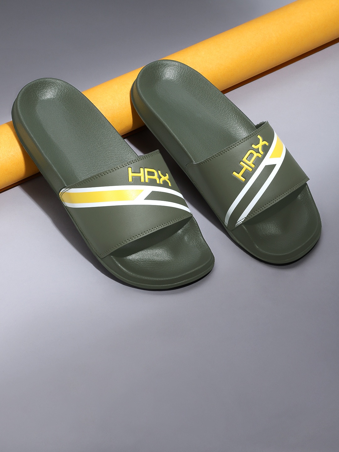 

HRX by Hrithik Roshan Men Olive Green & Yellow Brand Logo Print Comfort Sliders
