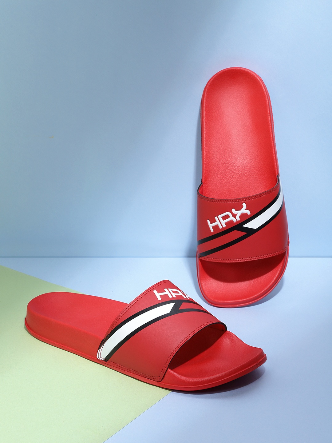 

HRX by Hrithik Roshan Men Red & White Brand Logo Print Comfort Sliders