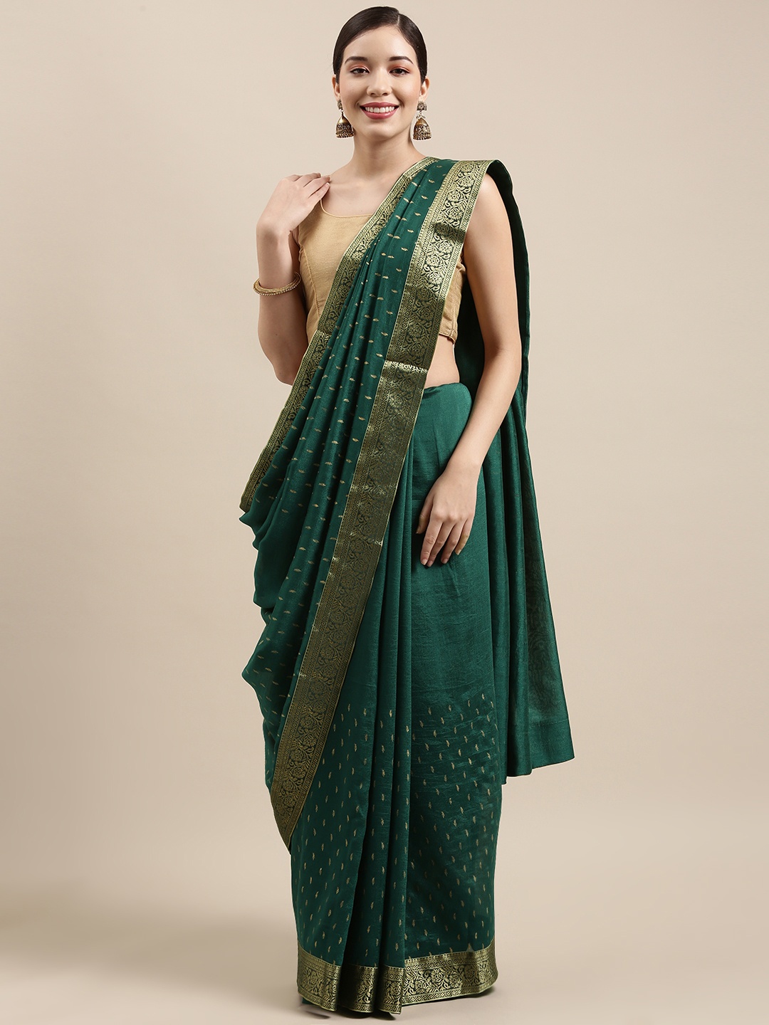 

Indian Women Green Ethnic Motifs Zari Silk Blend Saree