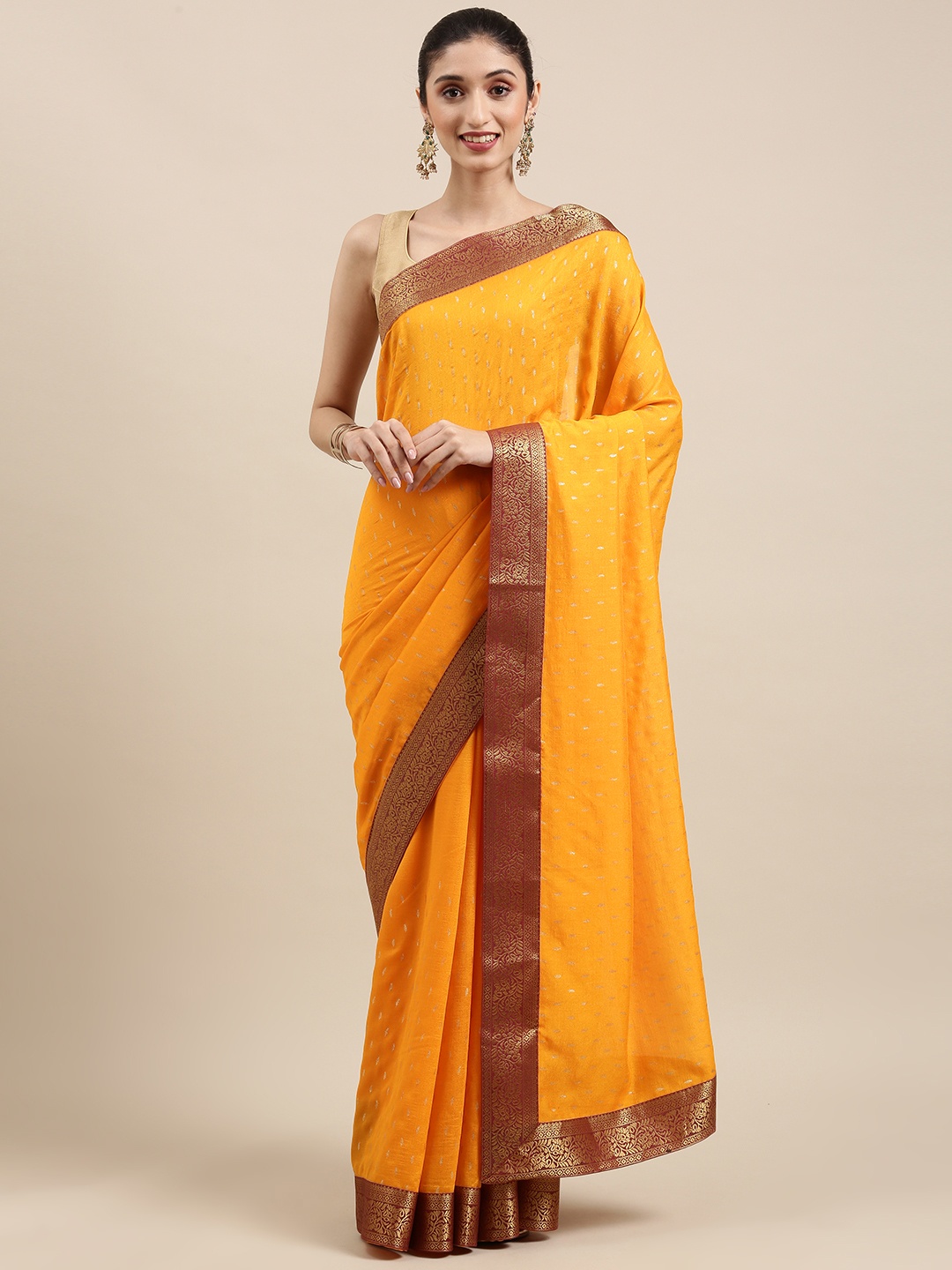 

Indian Women Yellow Ethnic Motifs Zari Silk Blend Saree