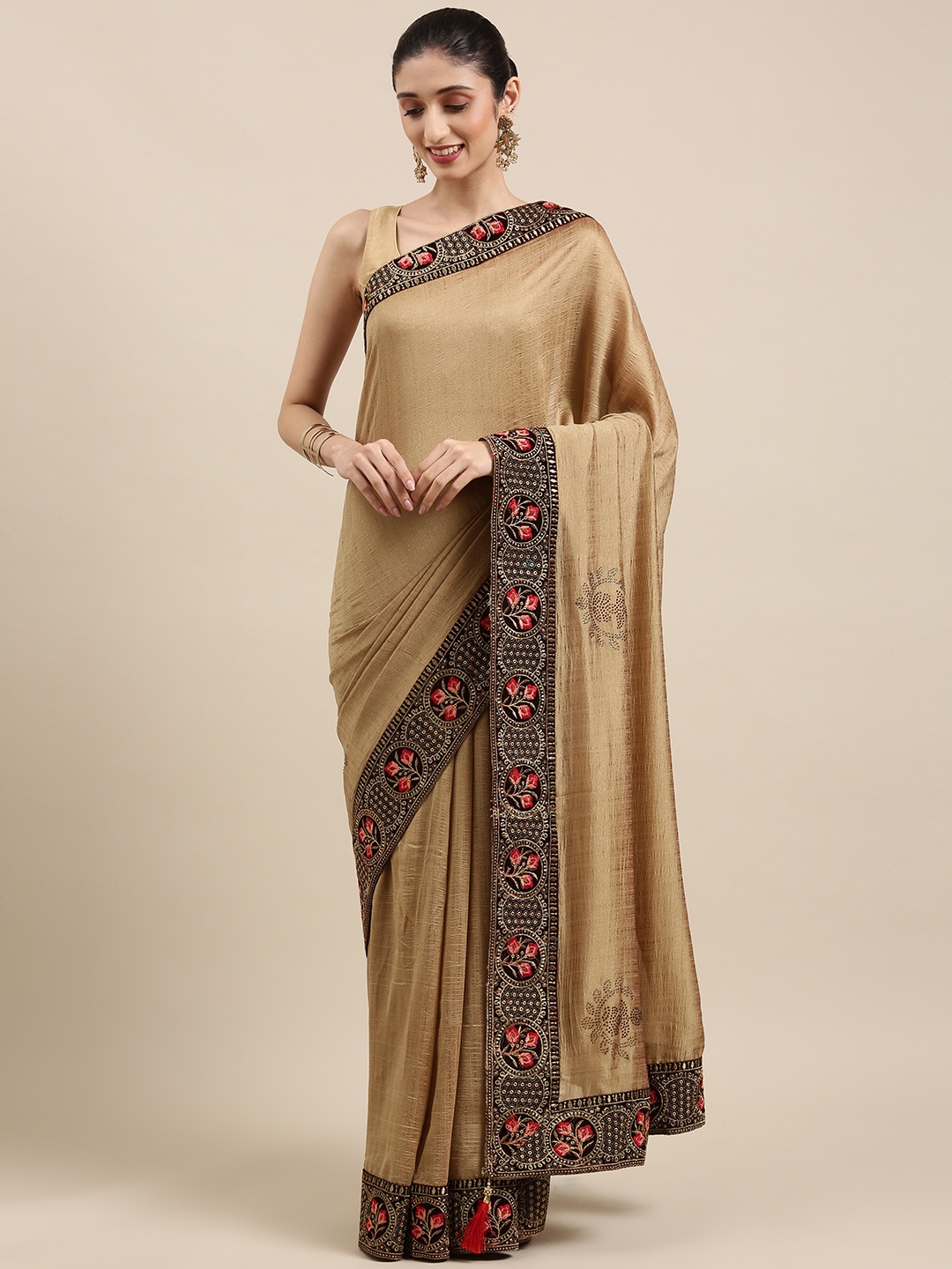 

Indian Women Beige Ethnic Motifs Sequinned Silk Blend Ikat Saree