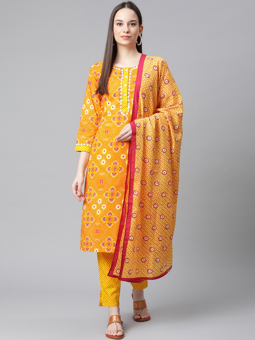 

Jompers Women Yellow Leheriya Printed Regular Pure Cotton Kurta with Trousers & With Dupatta