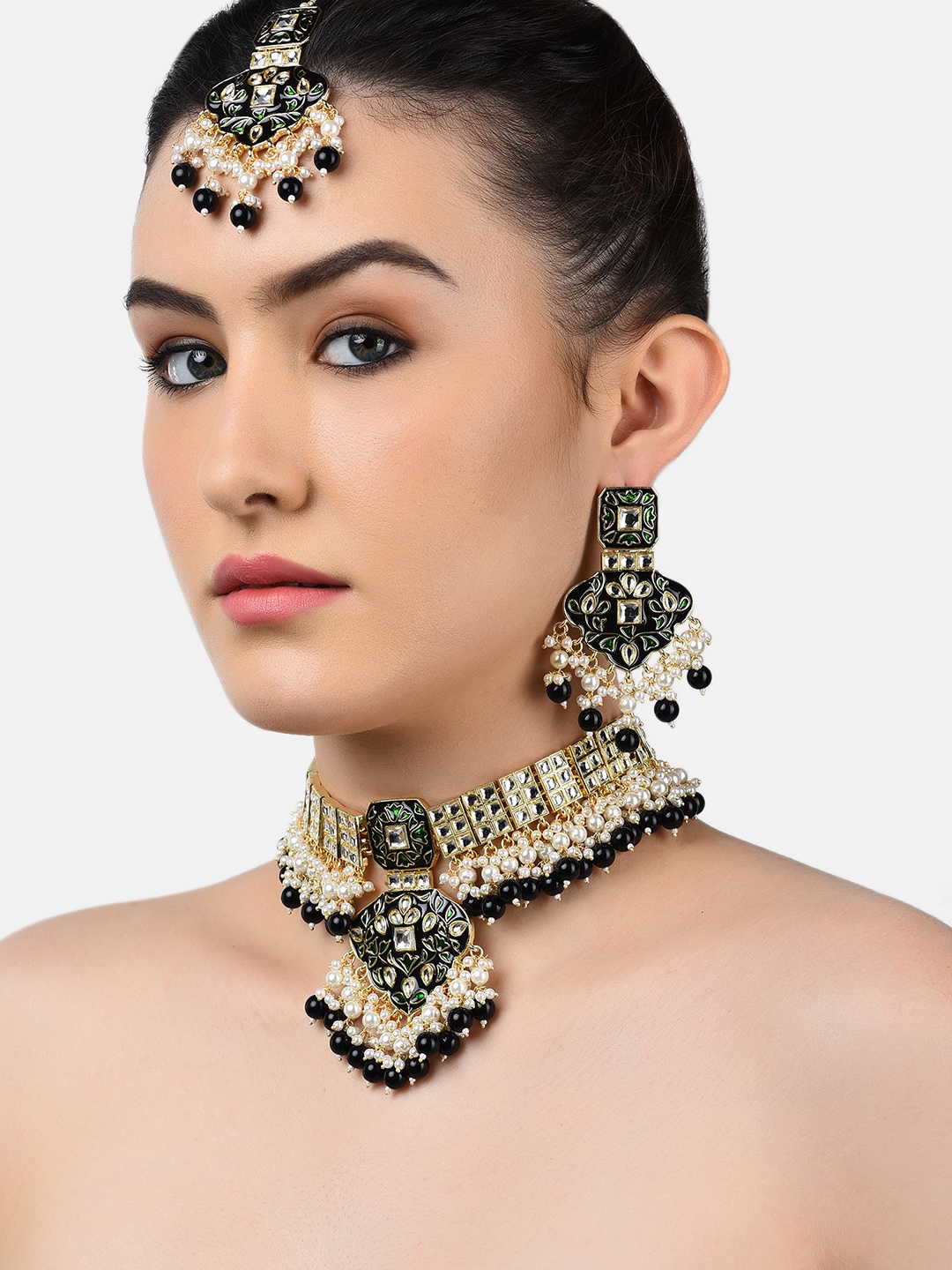 

Zaveri Pearls Gold-Plated White Kundan Studded Black & Green Beaded Meenakari Jewellery Set my dr