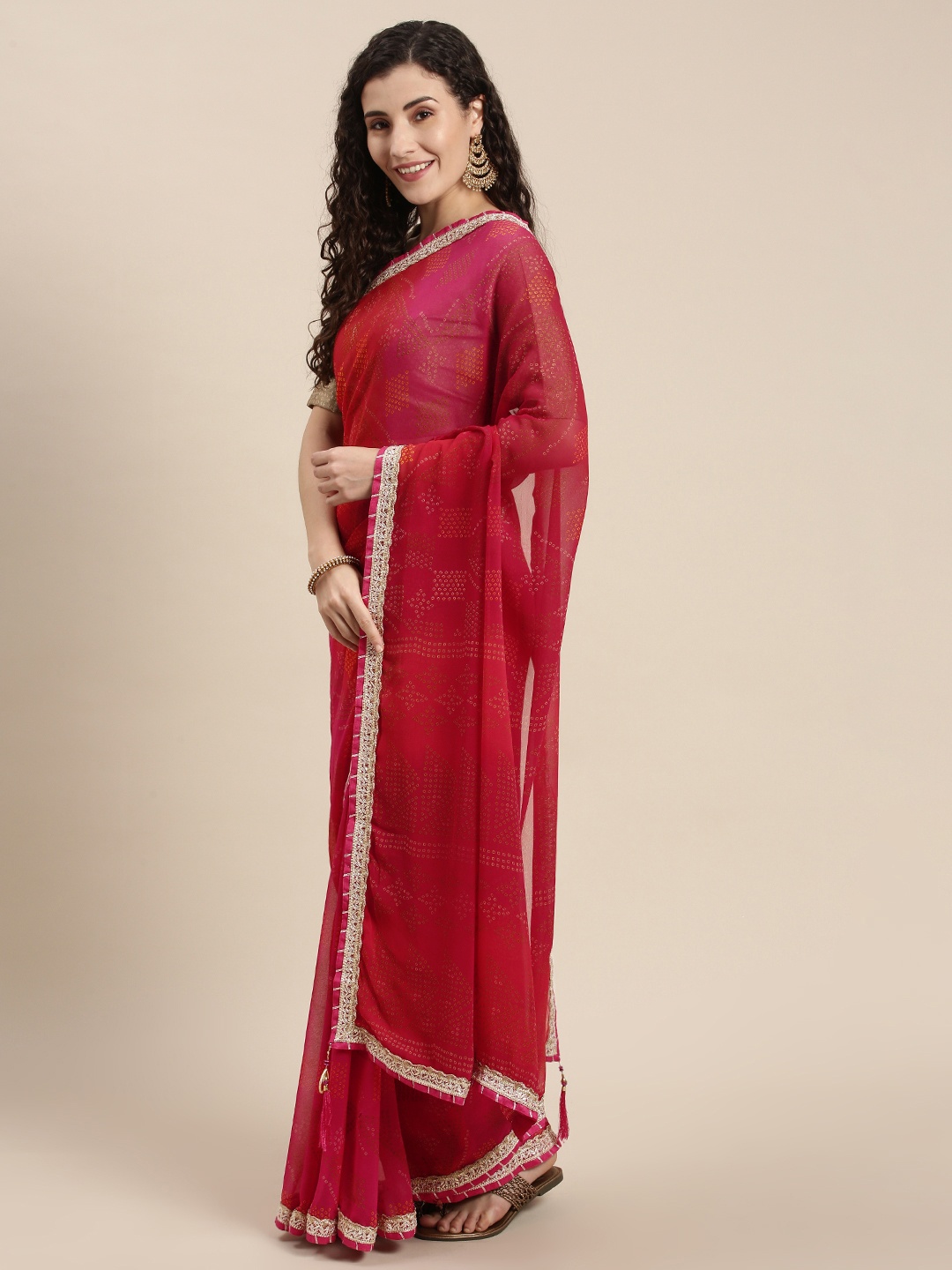 

Triveni Pink Bandhani Zari Pure Georgette Bandhani Saree