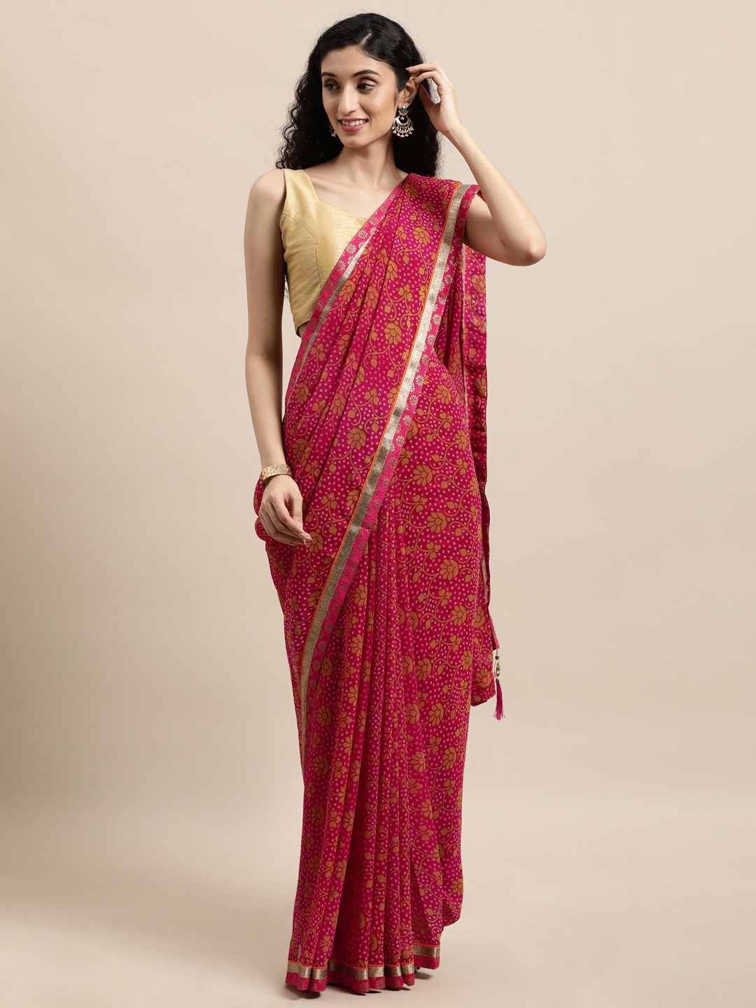 

Triveni Pink Bandhani Zari Pure Georgette Bandhani Saree