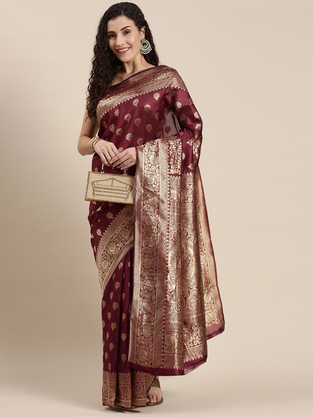 

Triveni Maroon Ethnic Motifs Zari Art Silk Saree