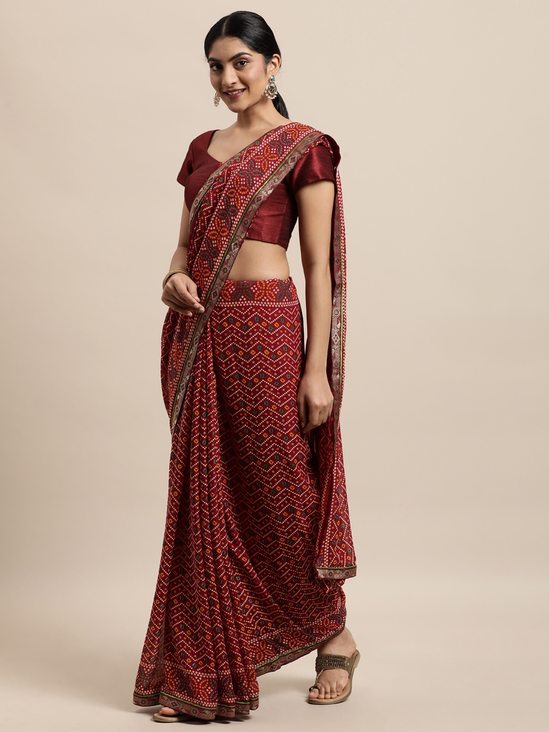 

Triveni Maroon Bandhani Pure Georgette Bandhani Saree