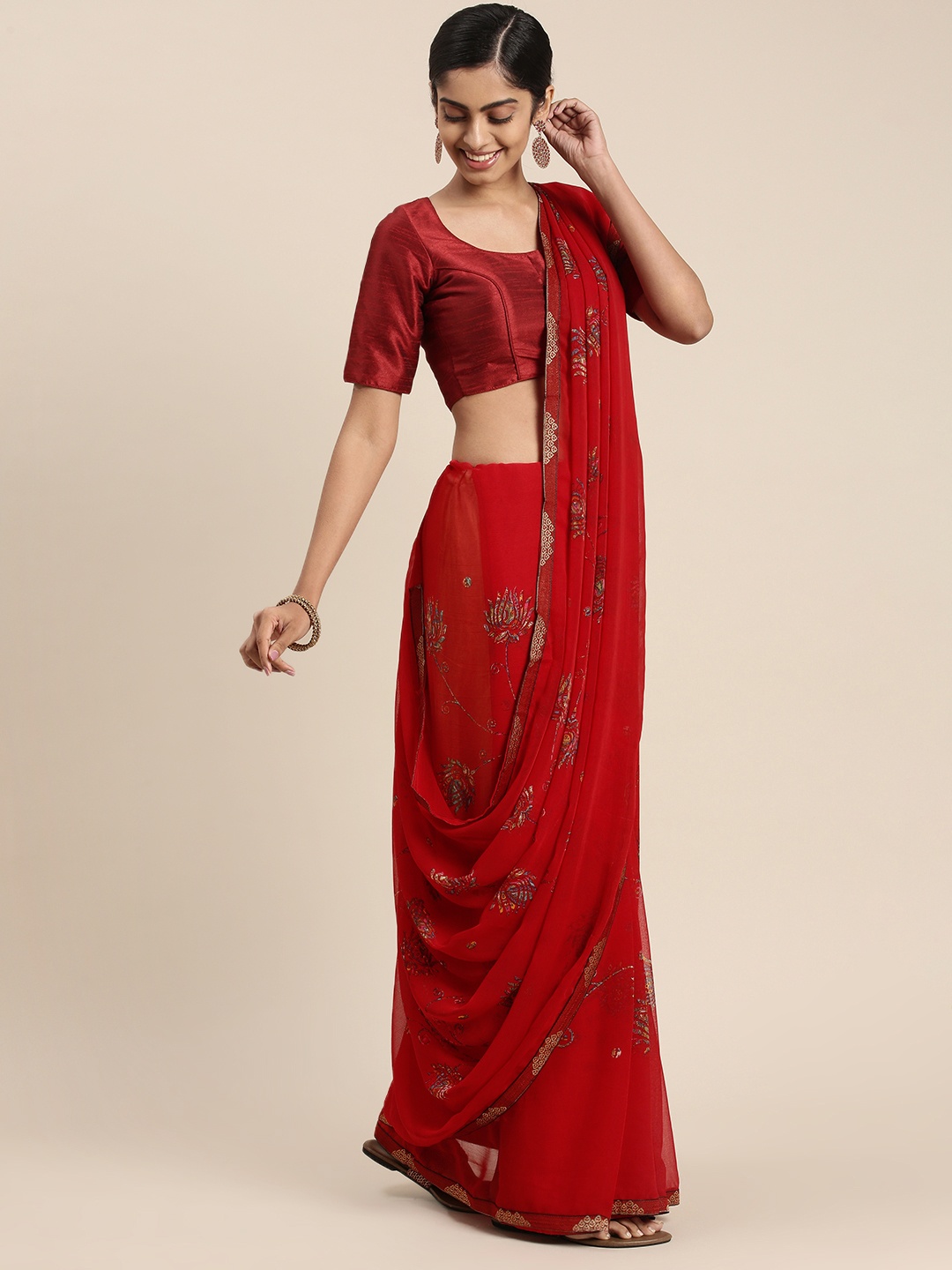 

Triveni Red Ethnic Motifs Zari Pure Georgette Saree