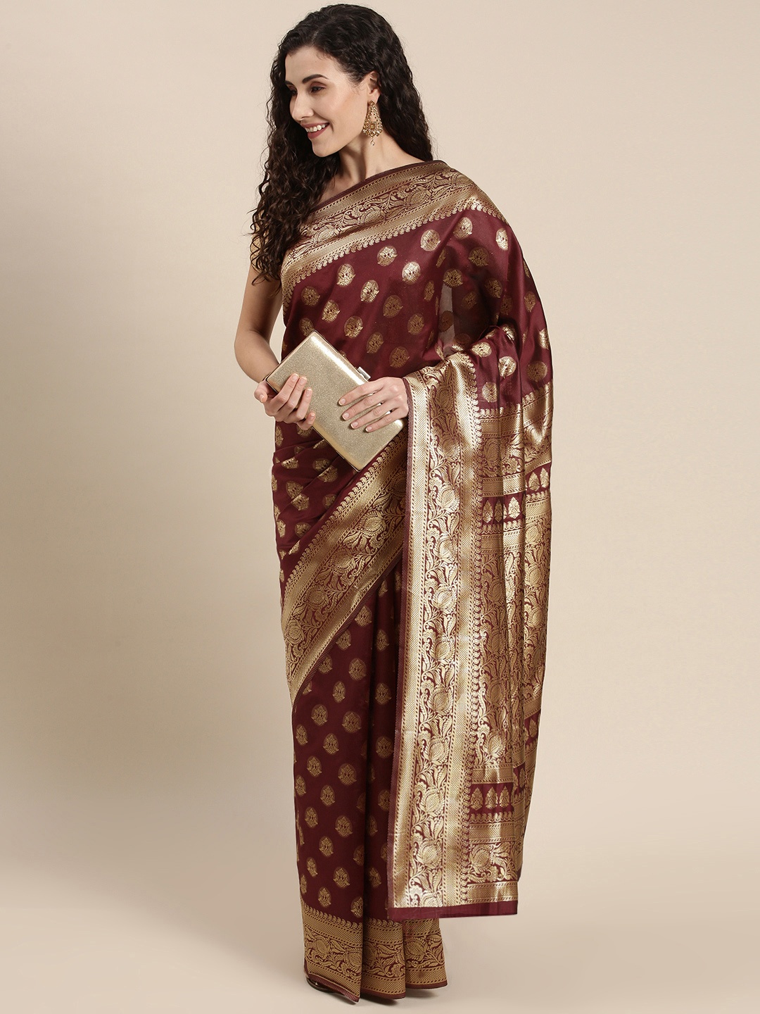 

Triveni Brown Ethnic Motifs Zari Art Silk Saree