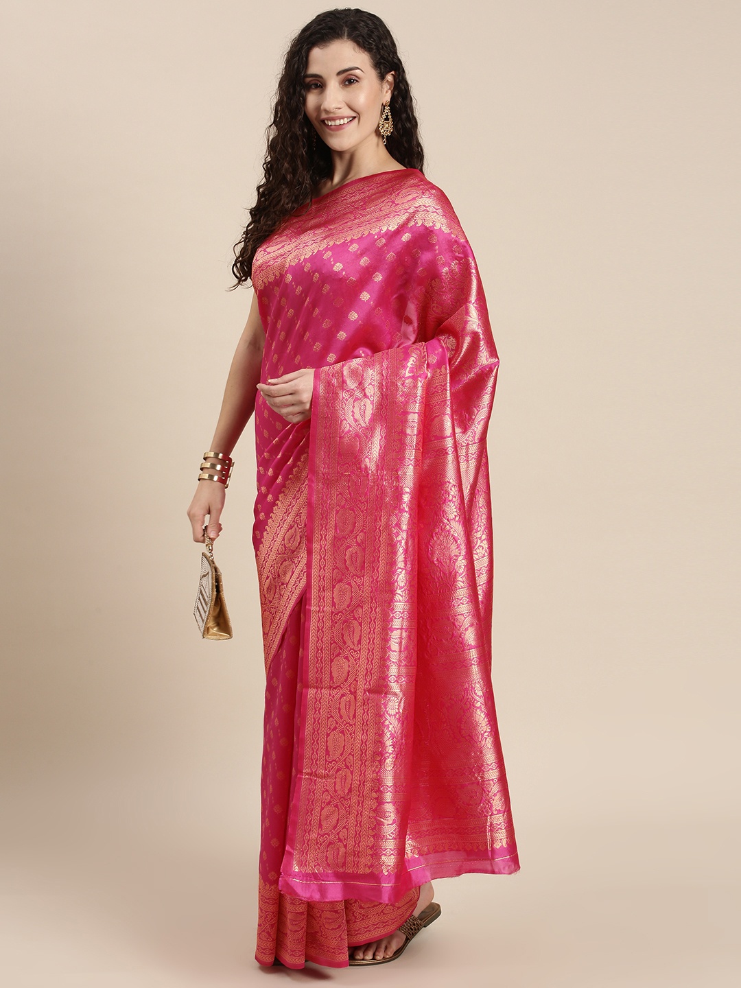 

Triveni Pink Ethnic Motifs Zari Silk Blend Saree