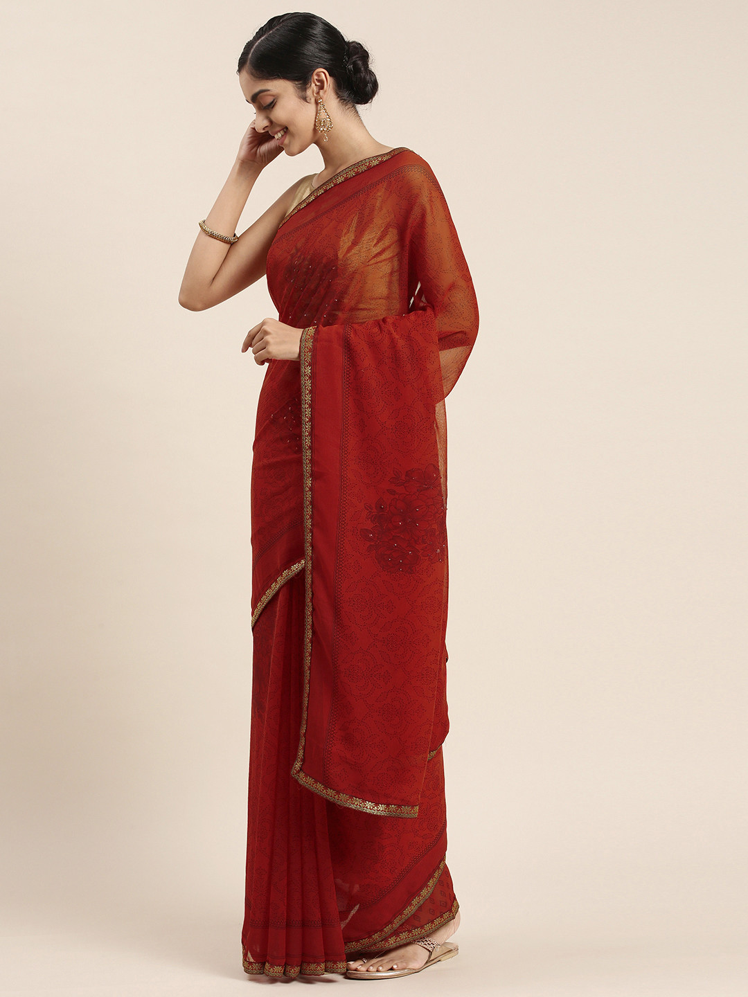 

Triveni Red Floral Beads and Stones Pure Chiffon Saree