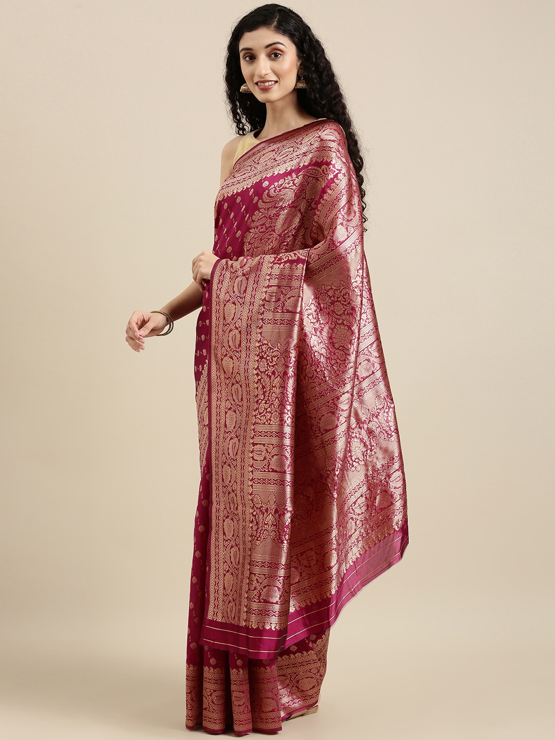 

Triveni Magenta Ethnic Motifs Zari Silk Blend Saree