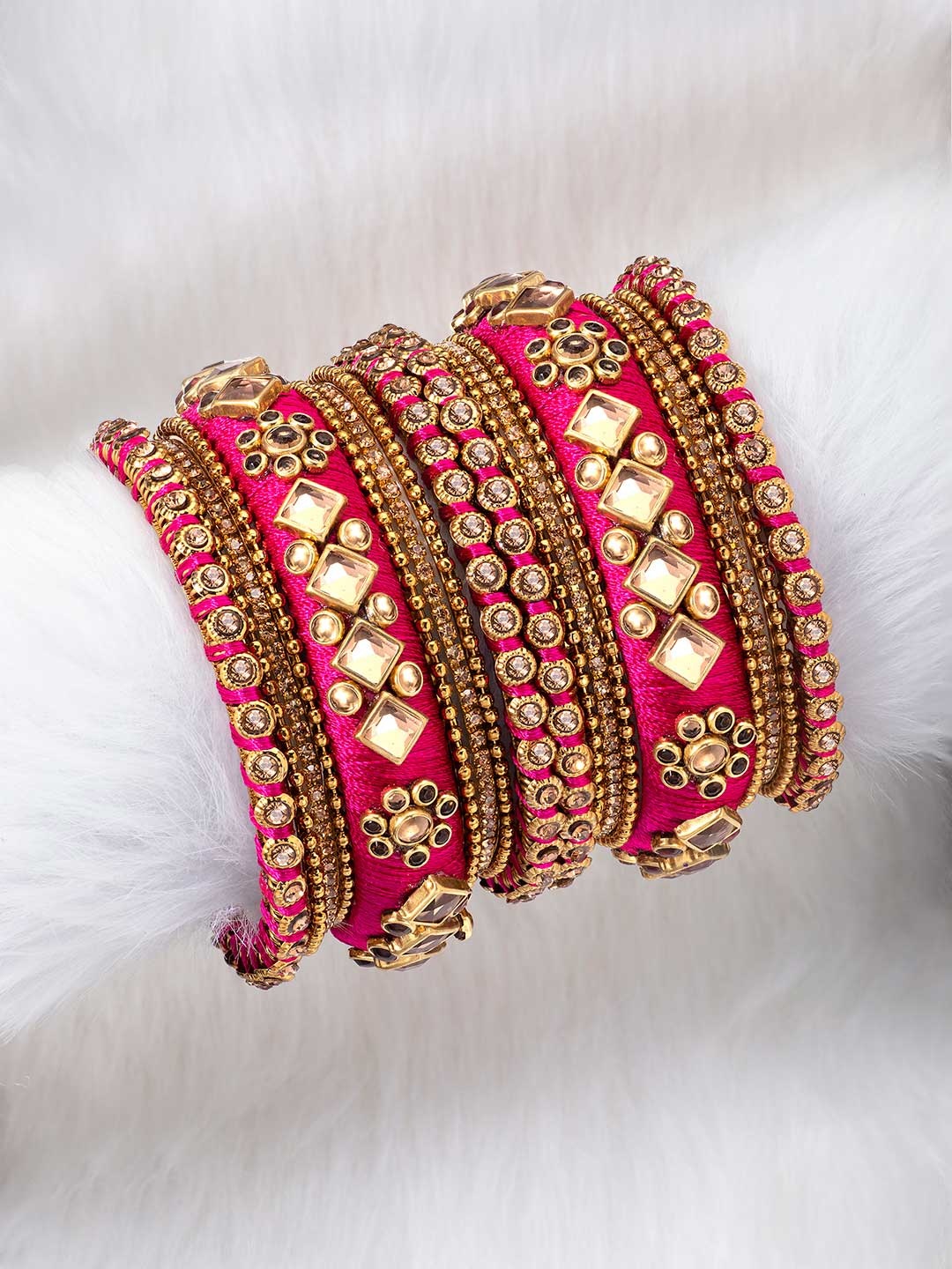 

Peora Women Set of 10 Magenta Silk Thread & Stone Studded Chuda Bangles