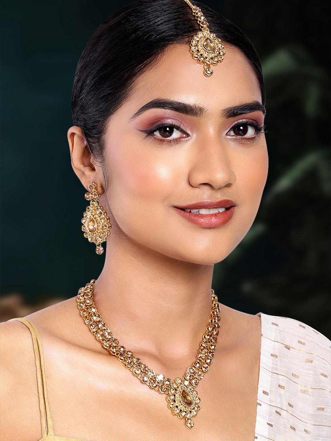 

Peora Gold-Plated Brass American Diamond Studded Jewellery Set With Maang Tika