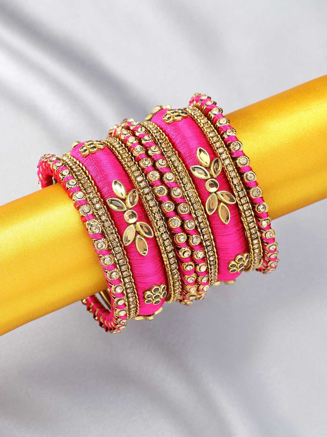 

Peora Set of 10 Magenta Gold-Plated Designer Silk Thread Studded Bridal Chuda Bangles