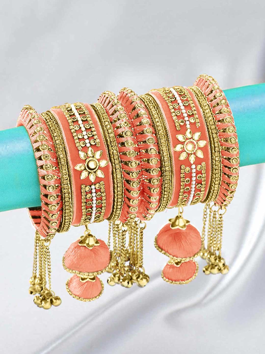 

Peora Set Of 10 Peach-Coloured & Gold-Plated Kundan Silk Thread Matching Bangle Set