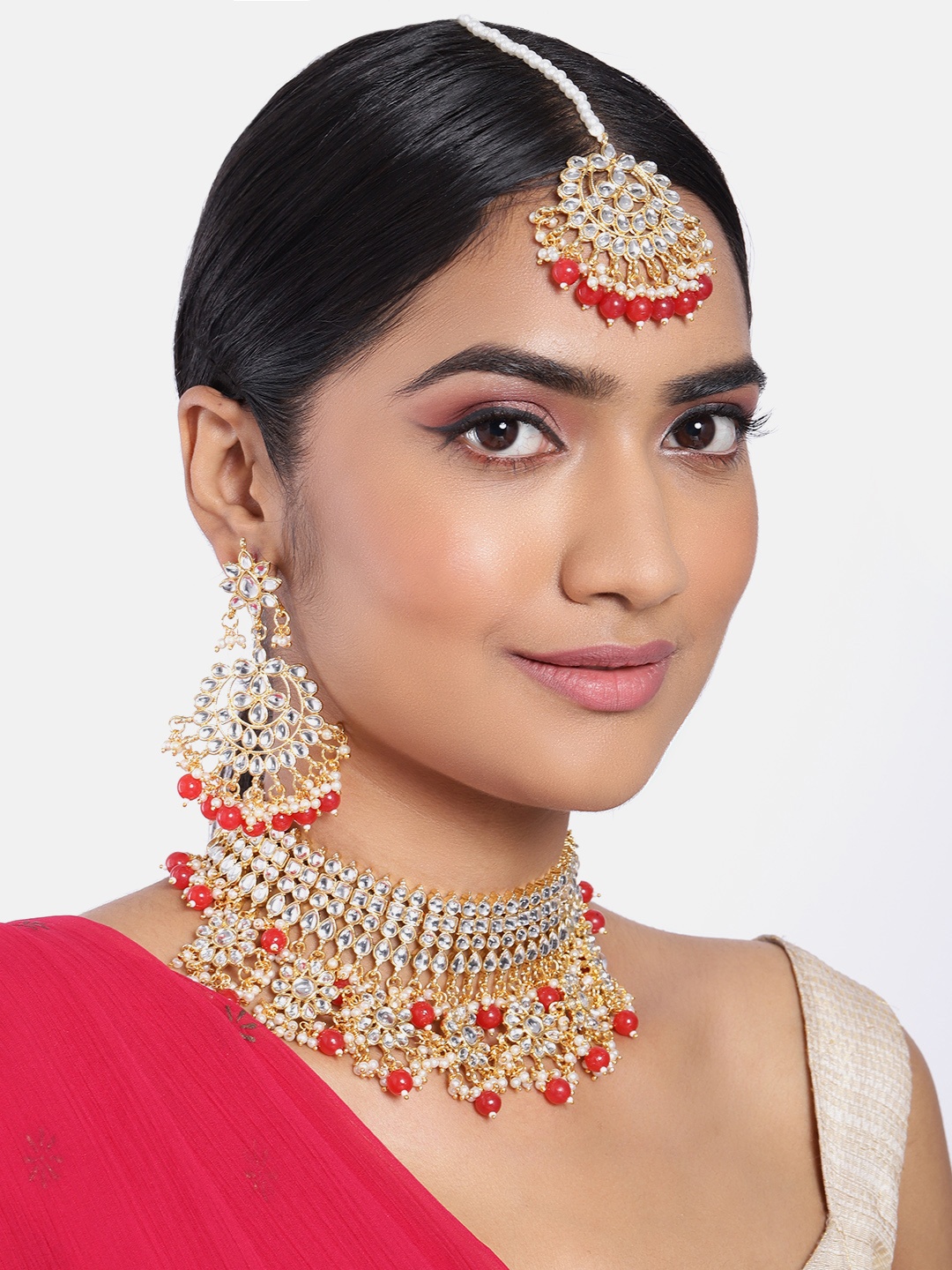

Peora Red & Gold-Plated Floral Shaped Kundan Embellished Handcrafted Jewellery Set