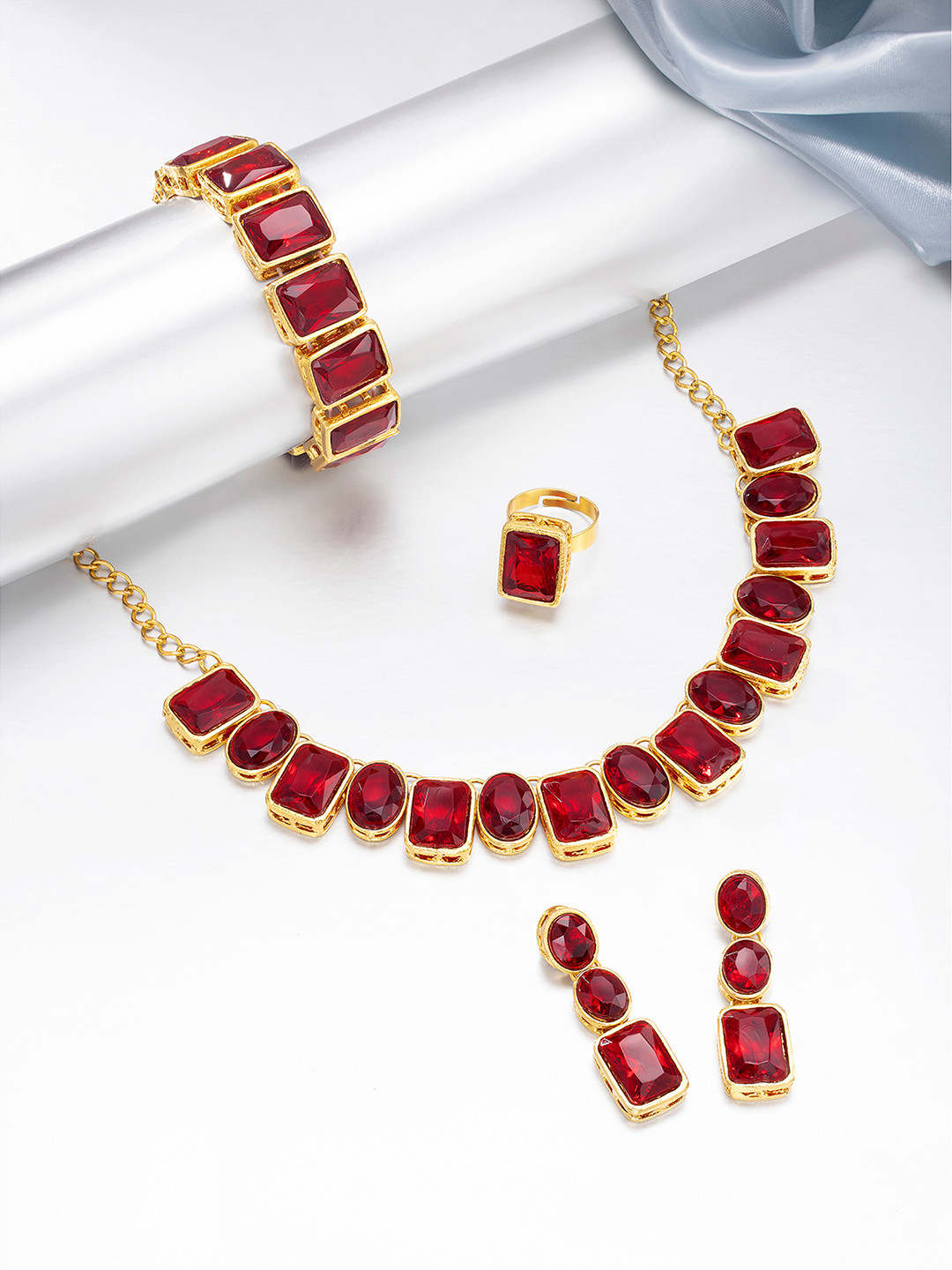 

Peora Maroon & Gold Plated Crystal Studded Handcrafted Jewellery Set