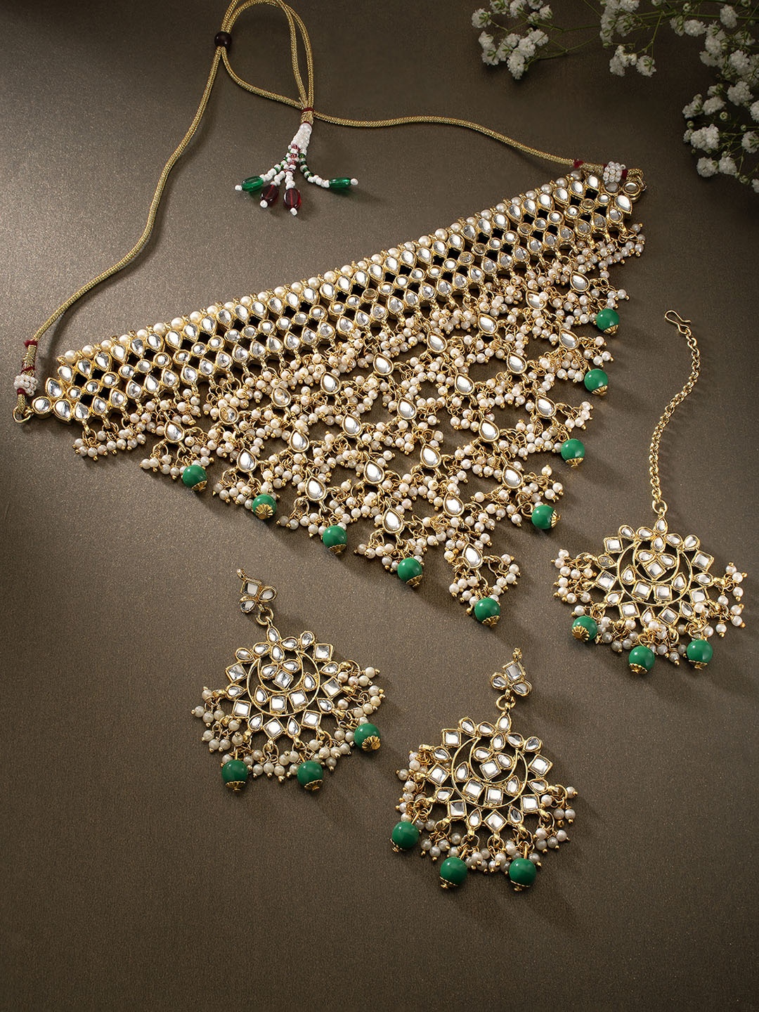 

Peora Green & White Gold-Plated Kundan Embellished Handcrafted Jewellery Set