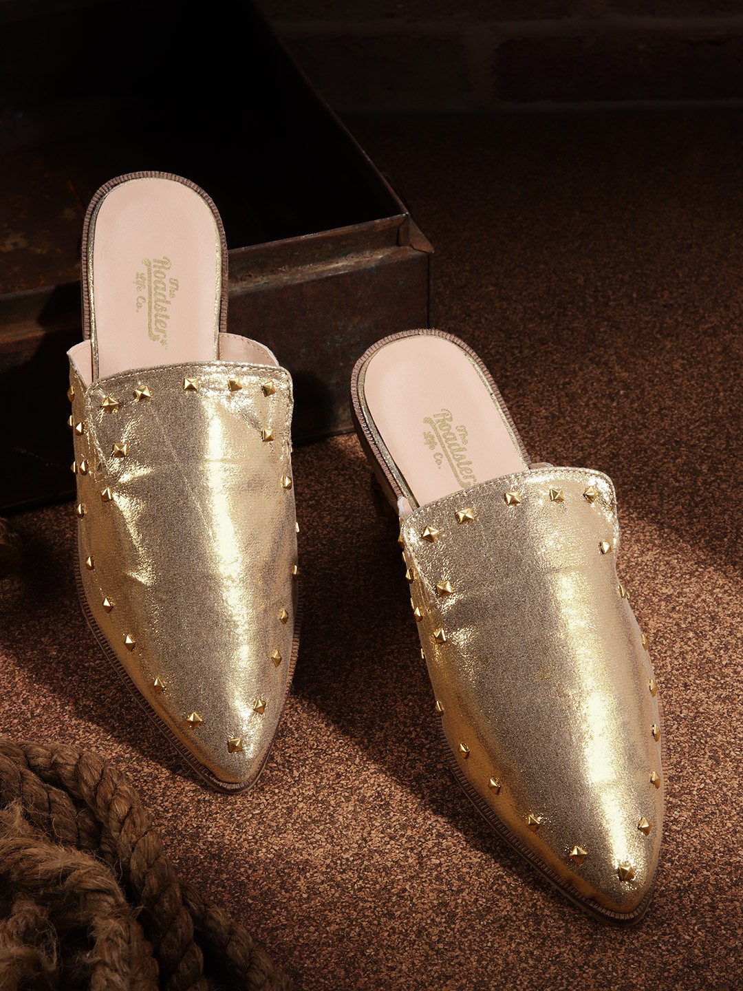 

Roadster Women Gold-Toned Shimmer Mules with Metallic Studded Detail