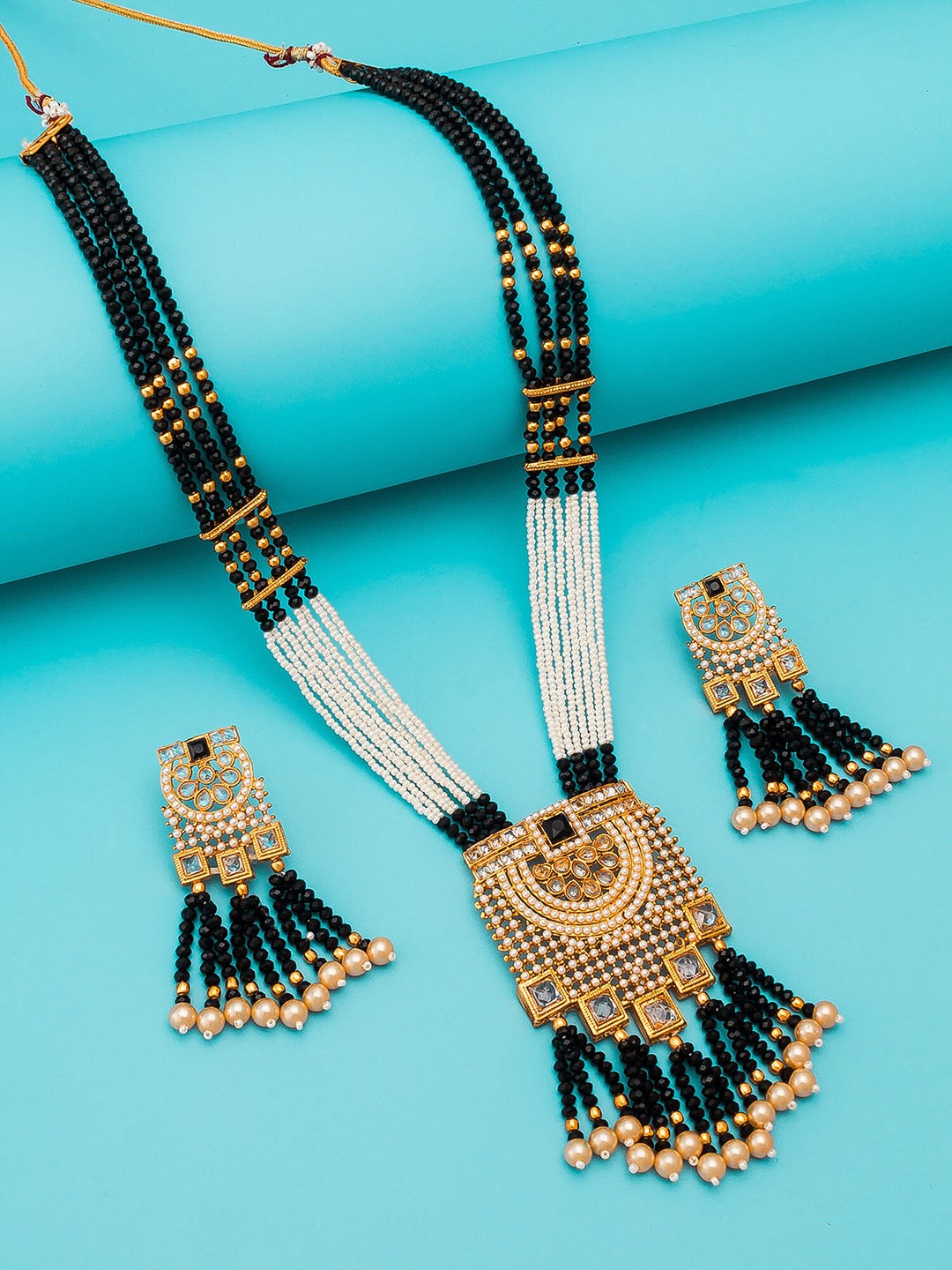 

aadita Gold-Plated Black & White Stone-Studded & Pearl Beaded Handcrafted Embellished Jewellery Set